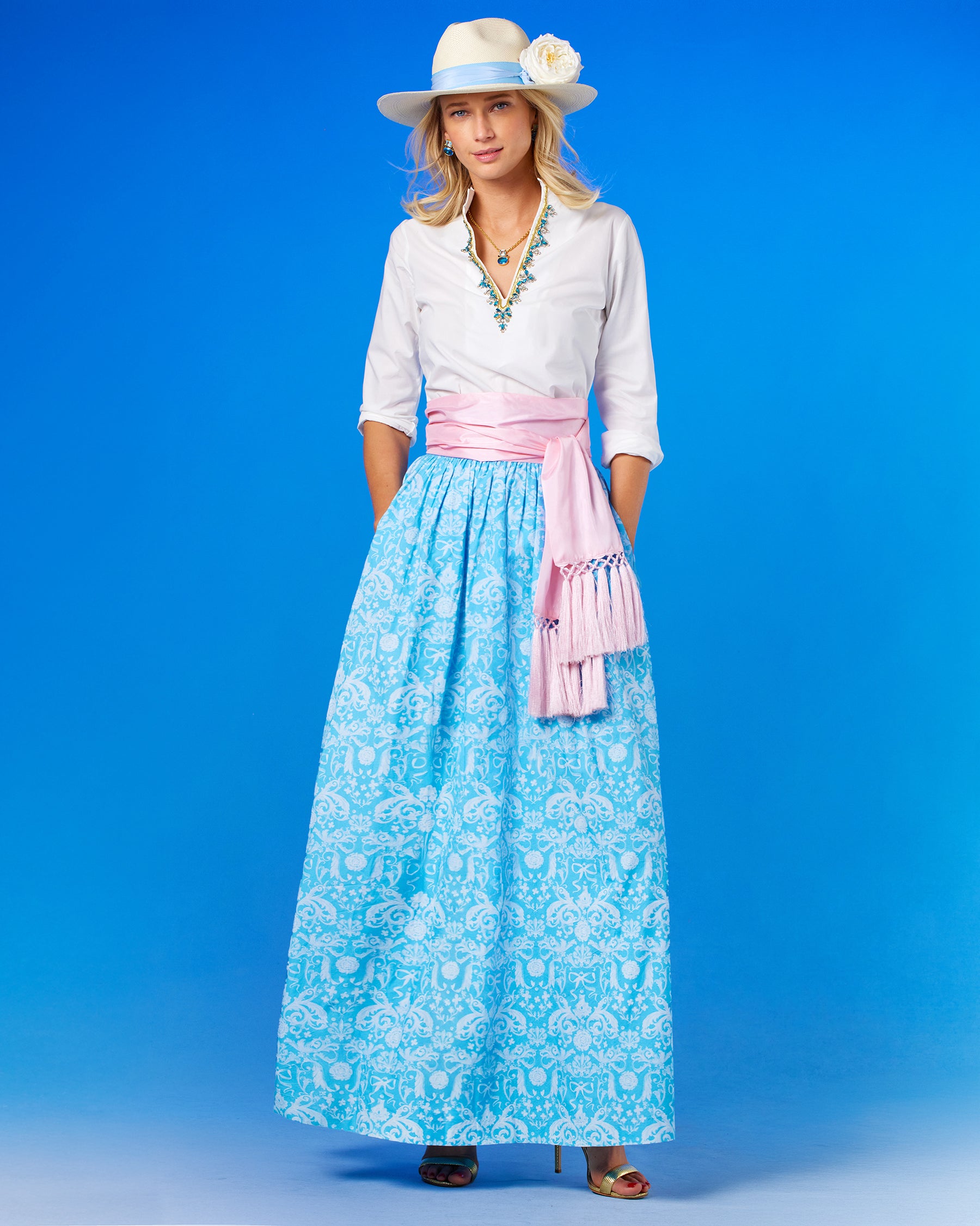 Alexandra Long Full Skirt in Porcelain Regency Ribbons worn with the Circe Tunic in Pure White with Crystals and Gold Embellishment and the Cosima Sash Belt in Blush Pink