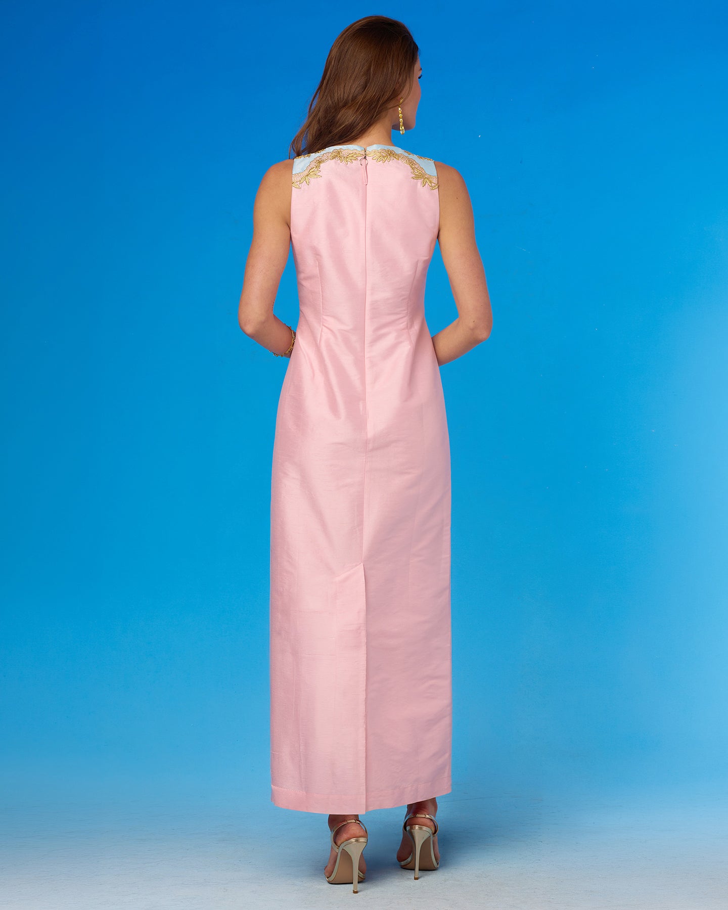 Back view of the Margaux Long Sheath Dress in Blush Pink With Blue Accent and Embellishment