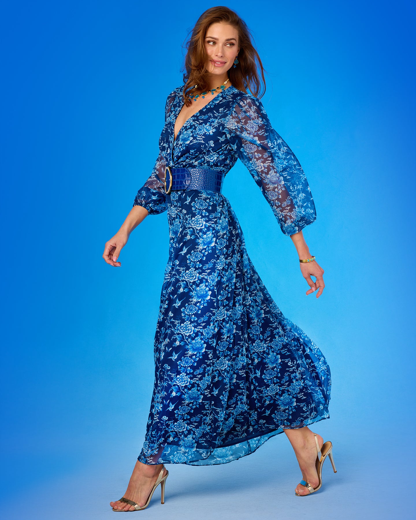 Angelina Maxi Crinkle Chiffon Dress in Navy Florals full length side view walking