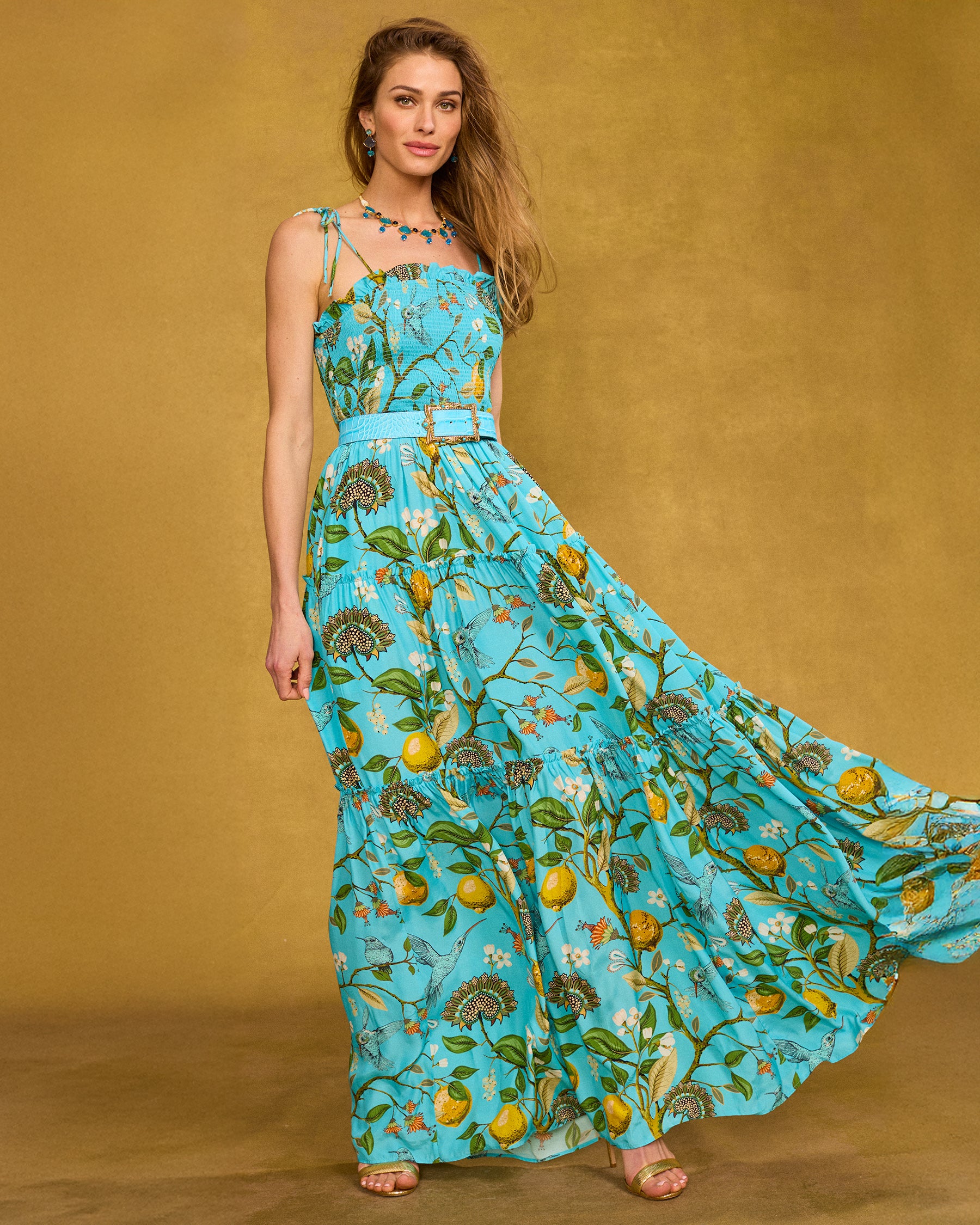 Annabelle Maxi Dress in Flora Turquoise Hummingbird Print front view with skirt flaring