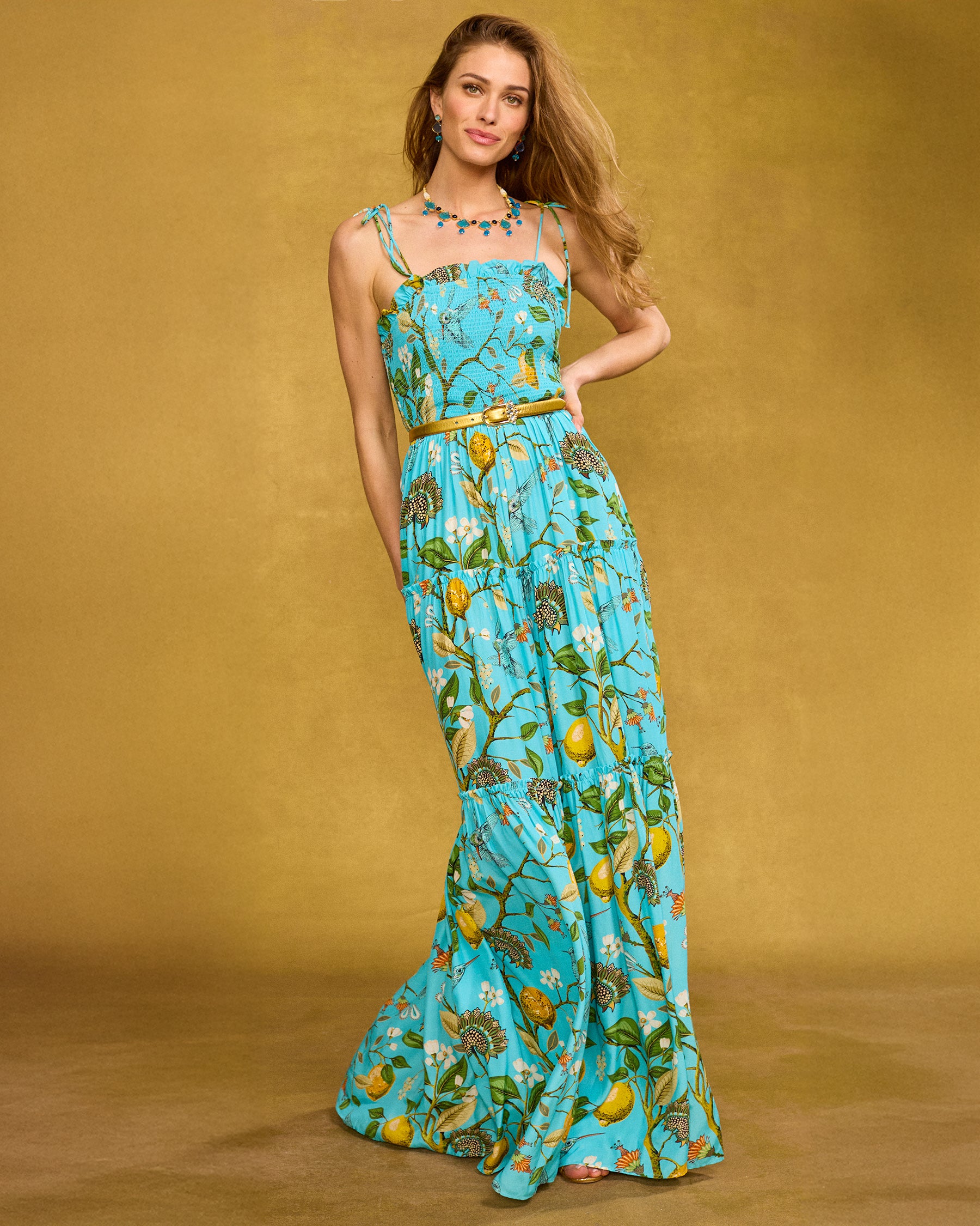 Annabelle Maxi Dress in Flora Turquoise Hummingbird Print front view with Harlow Gold Belt cinching the waist