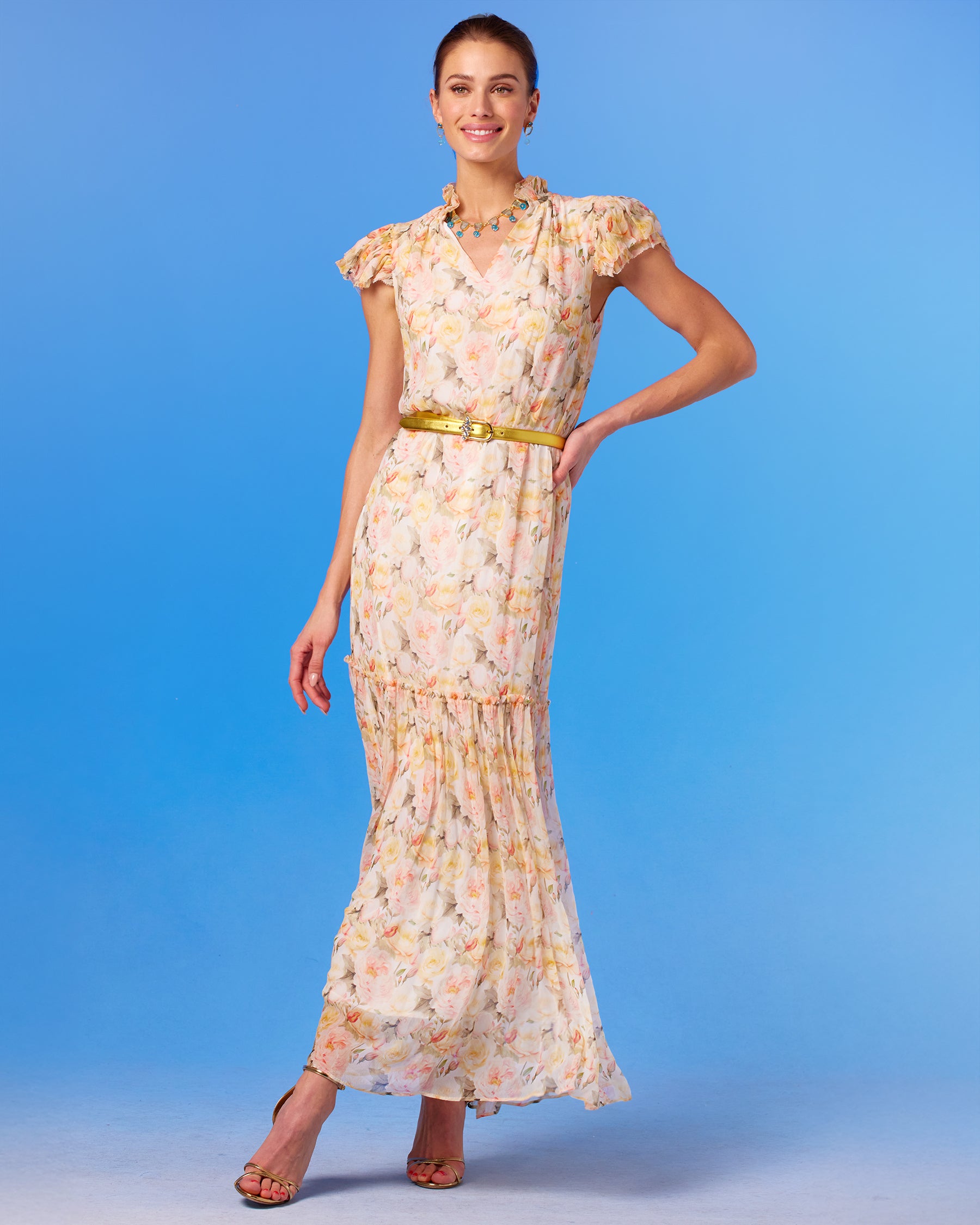 Harlow Gold Leather Belt in Blue Gem Accents worn with the Caroline Flutter Sleeve Crinkle Chiffon Maxi Dress in Pastel Roses