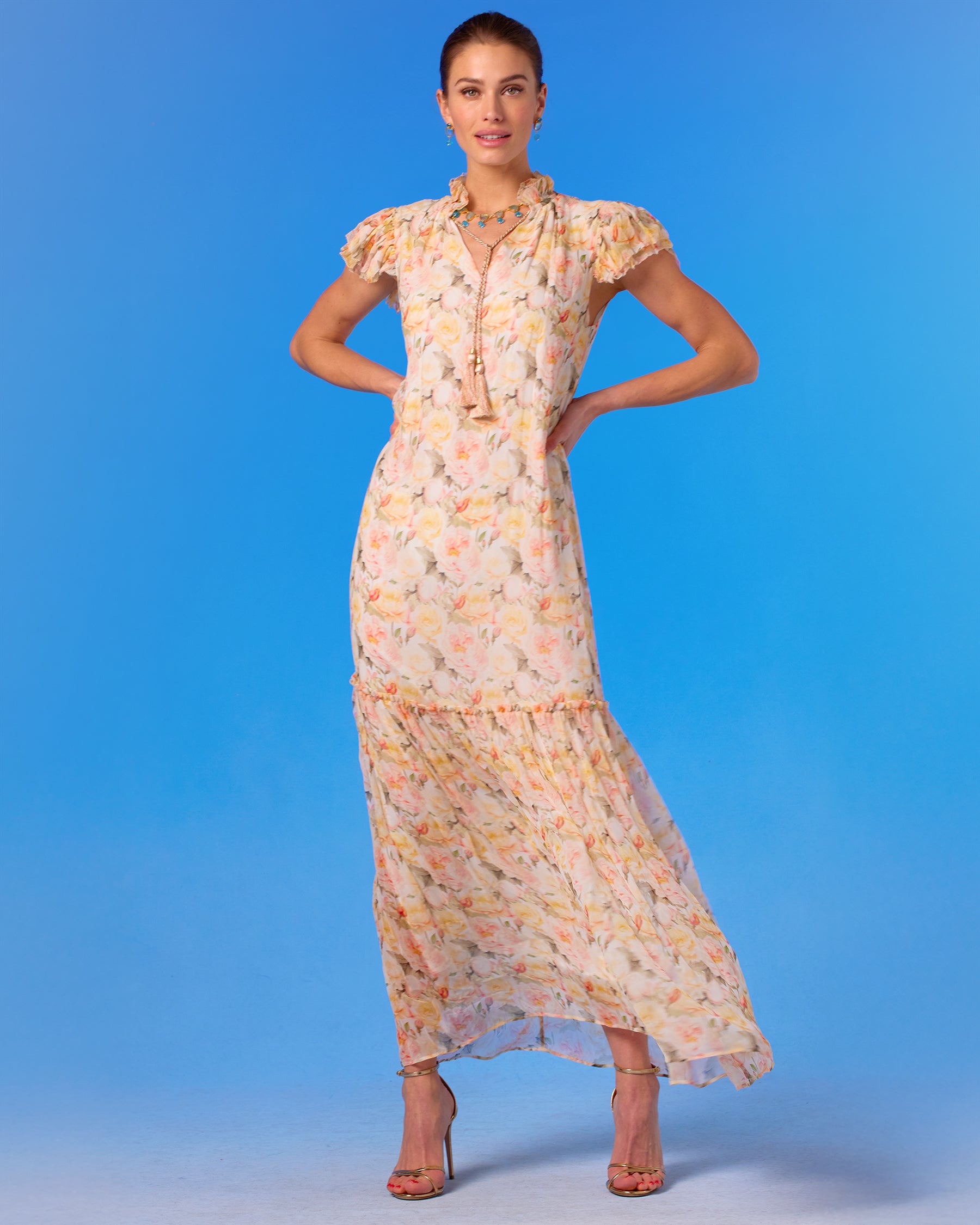 Caroline Flutter Sleeve Crinkle Chiffon Maxi Dress in Pastel Roses hands on hip