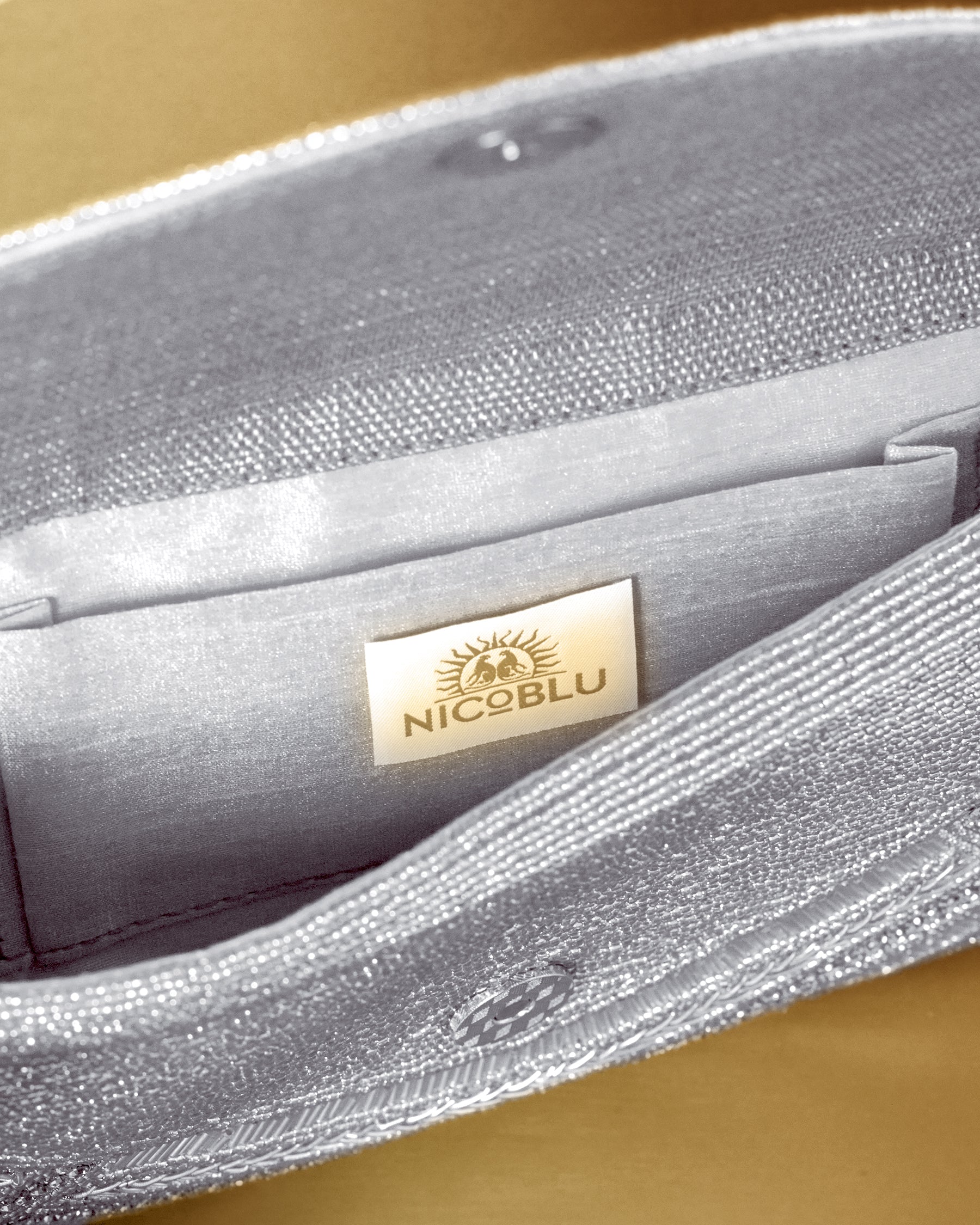 Betty Clutch in Beaded Silver interior