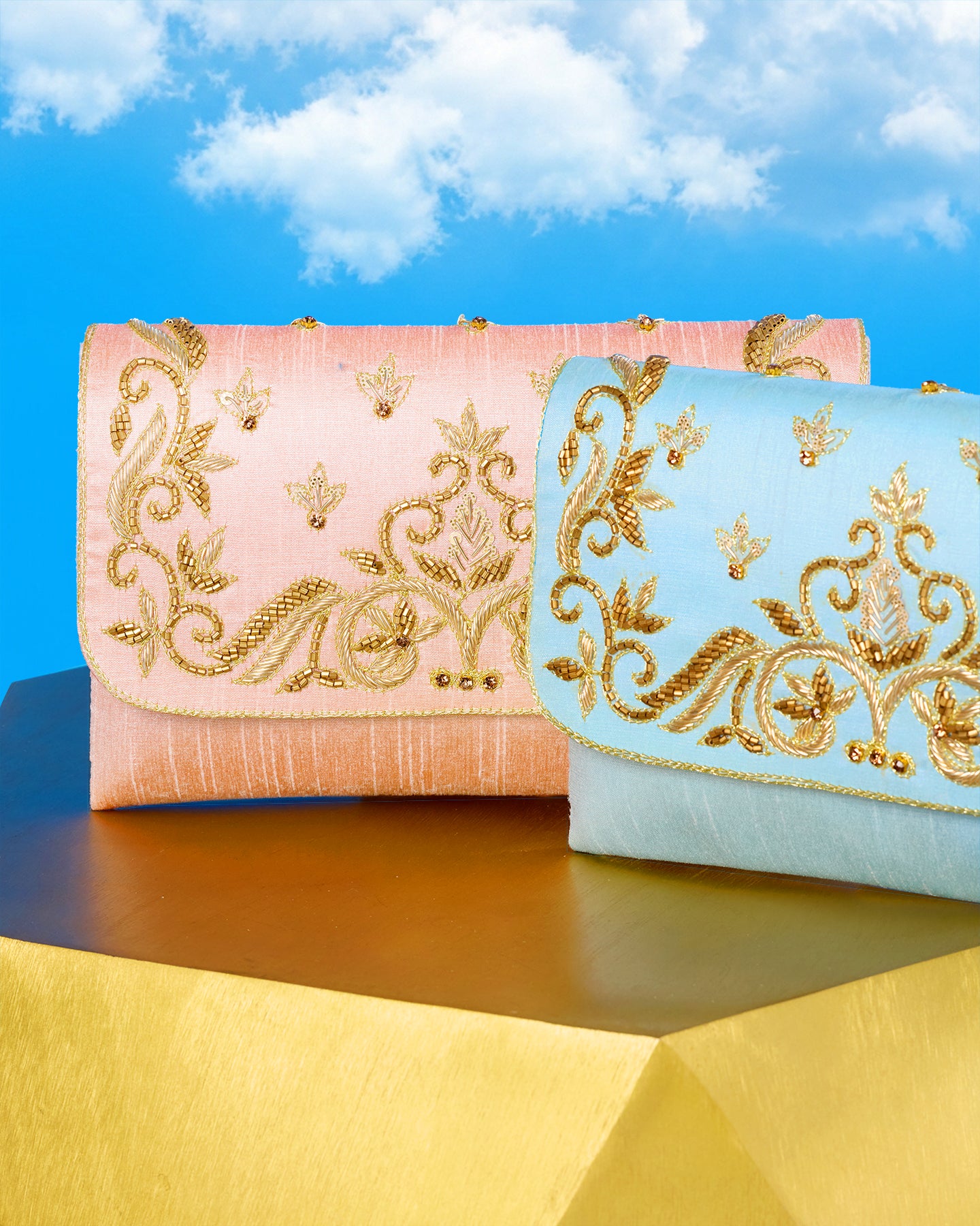 The Corelia Clutch in Pastel Blue and Gold Embellishment