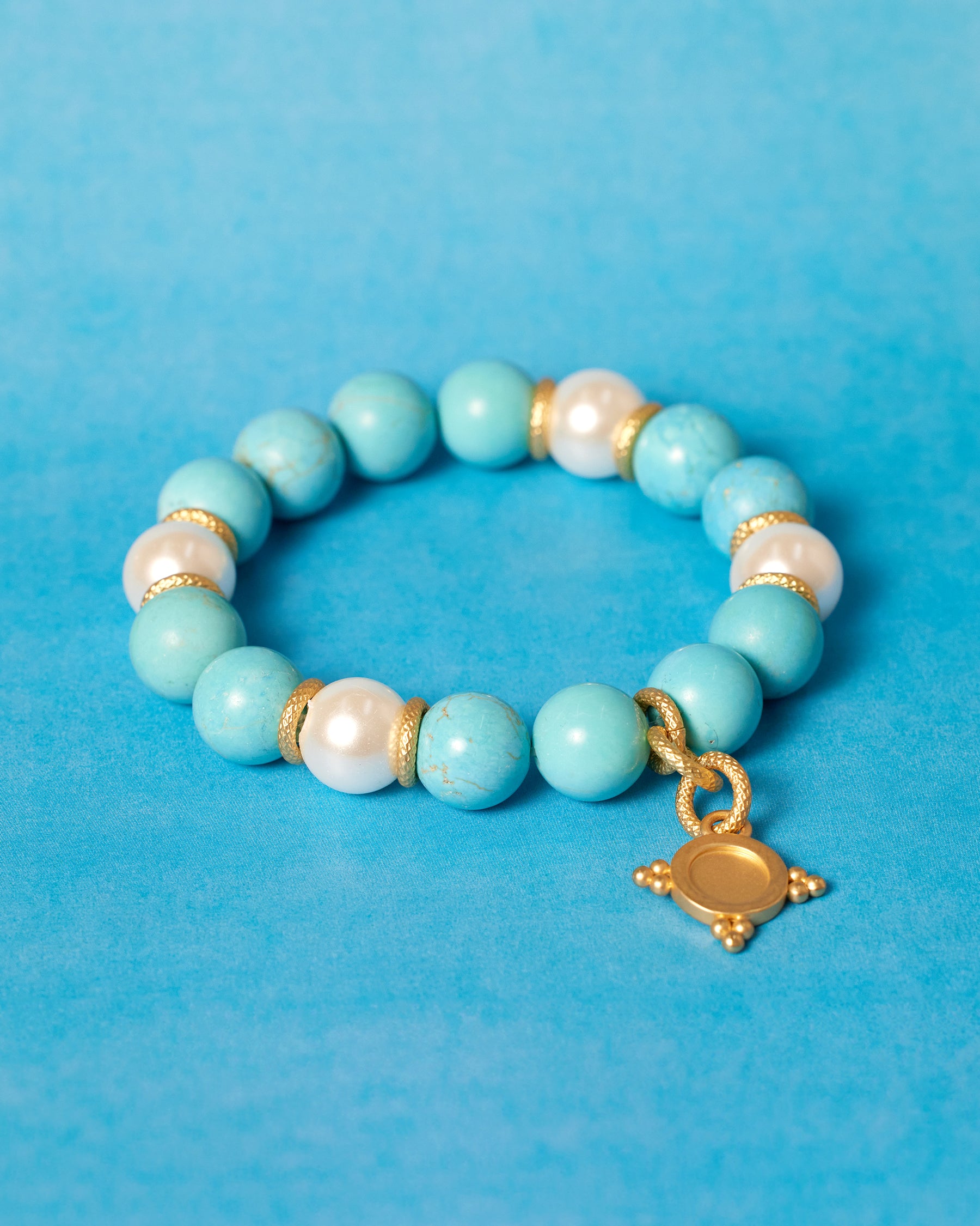 Deborah Grivas Turquoise Howlite and Glass Pearl Bracelet with Starburst Charm