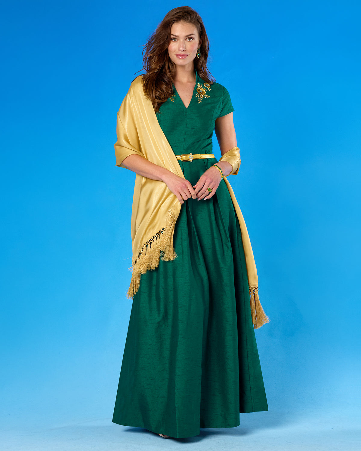 Isabella Cap-Sleeve Gown in Emerald Green, with a gold shawl