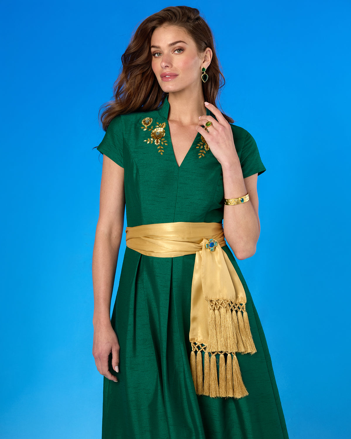 The Berkley Geometric Brooch in Cote D'Azur Blues pinning the Cosima Sash Belt
