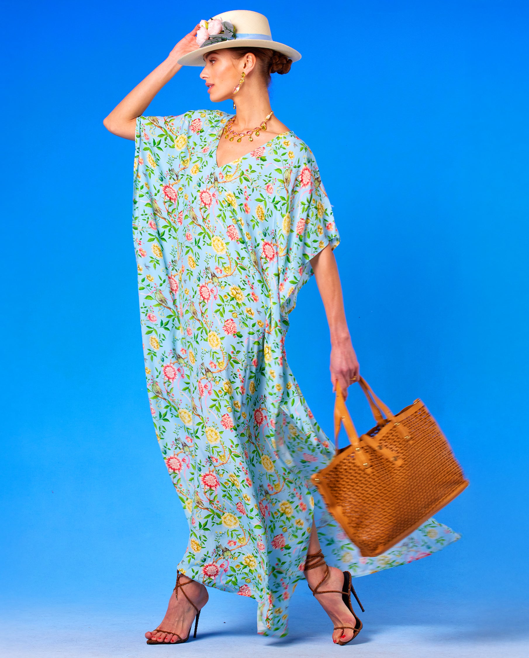 Kallista Kaftan in Antibes Florals walking side view