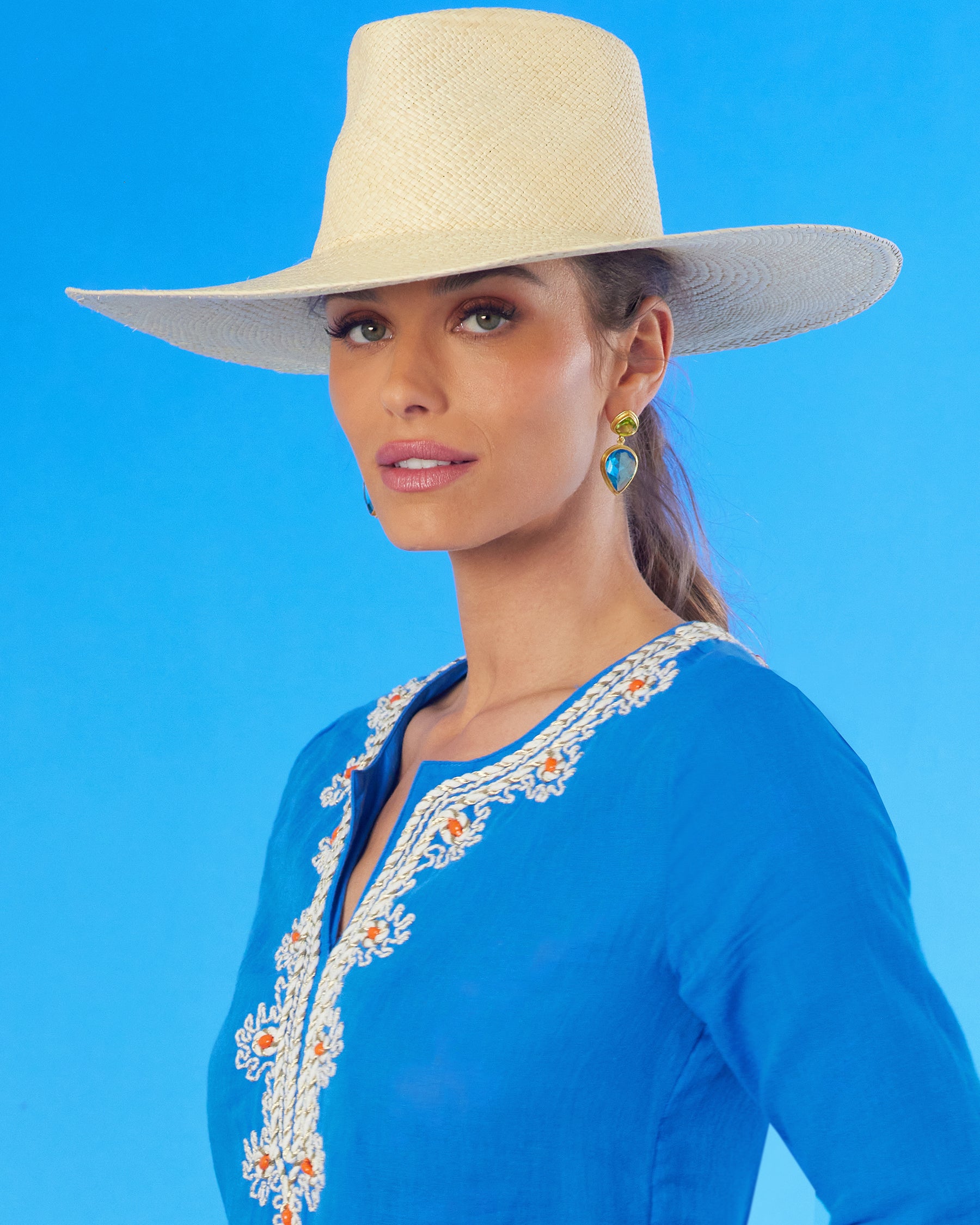 The Reinhard Plank Forte Panama Straw Hat worn with the Mallorca Tunic with Coral Embellishment