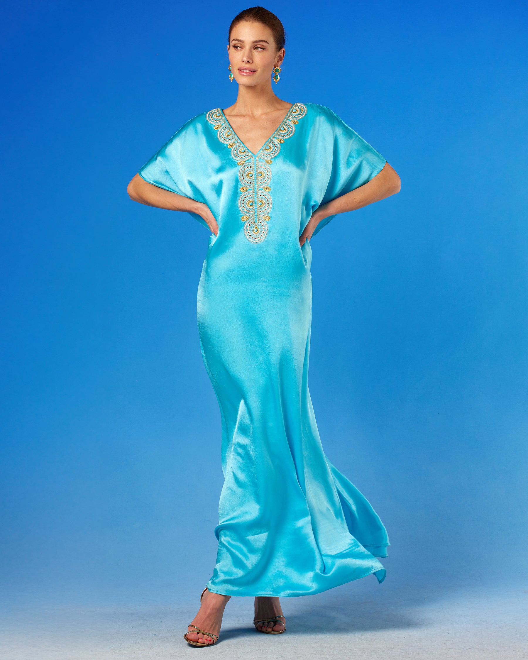 Noor Silk Kaftan in Turquoise hands on hips
