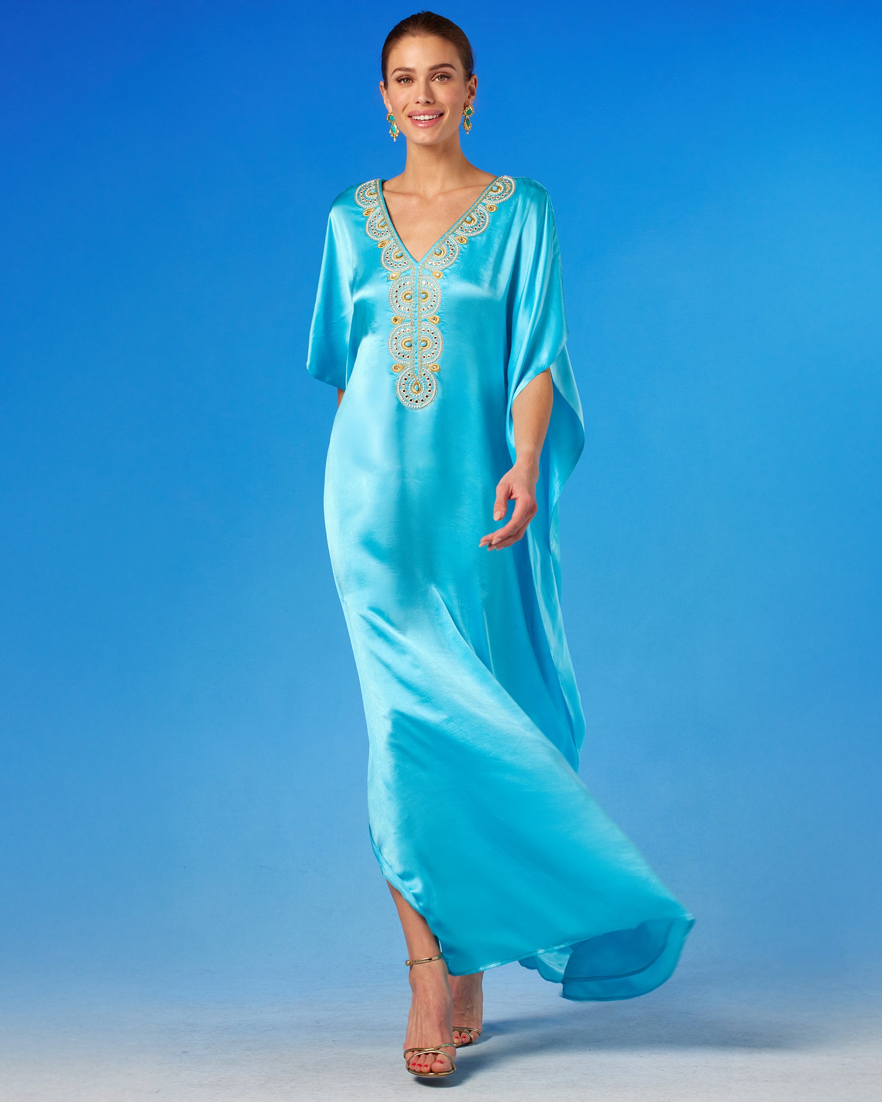 Noor Silk Kaftan in Turquoise front view walking