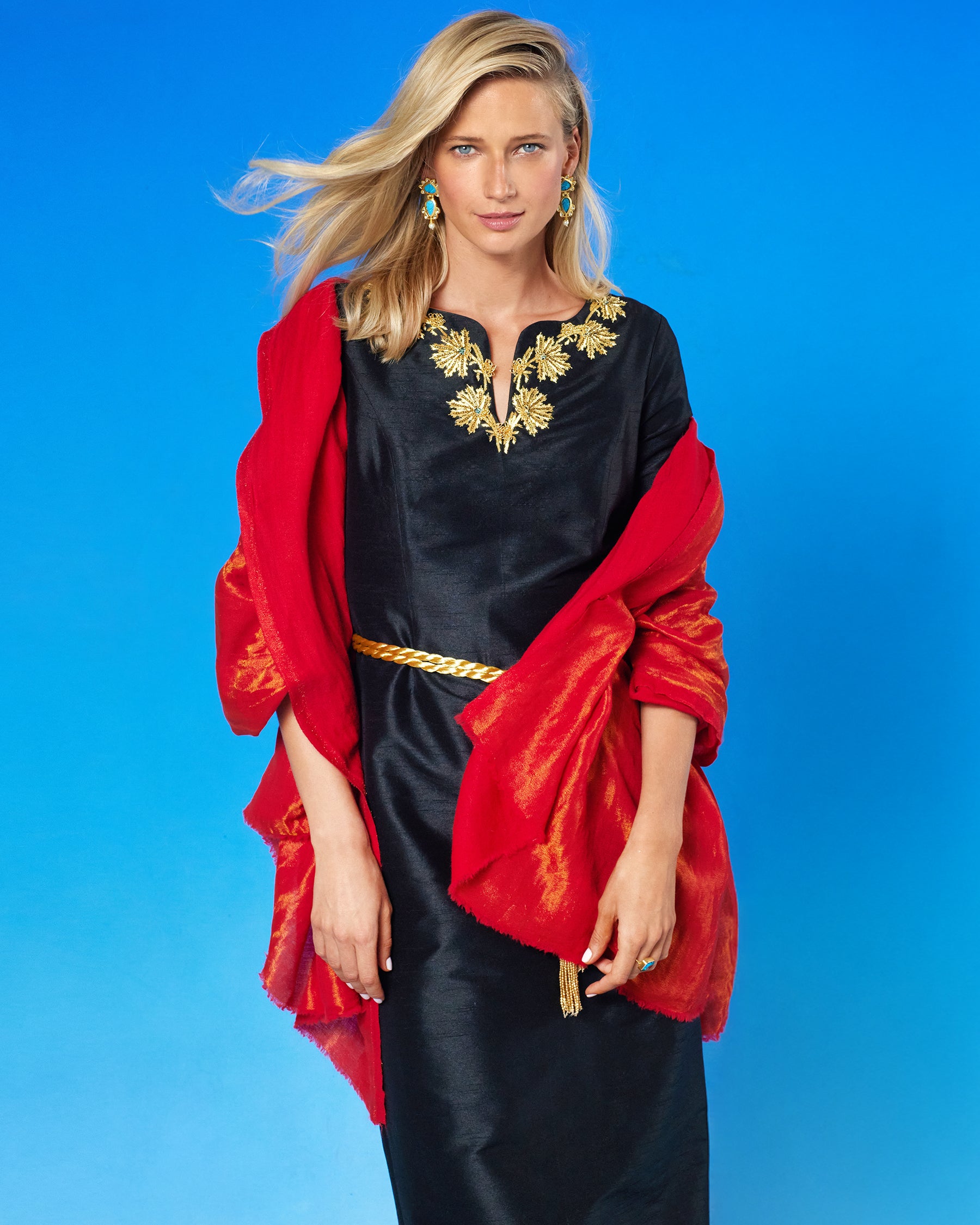 Octavia Long Dress in Black and Gold Palm Embellishment worn with the Josephine Reversible Pashmina Shawl in Gold Shimmer Red