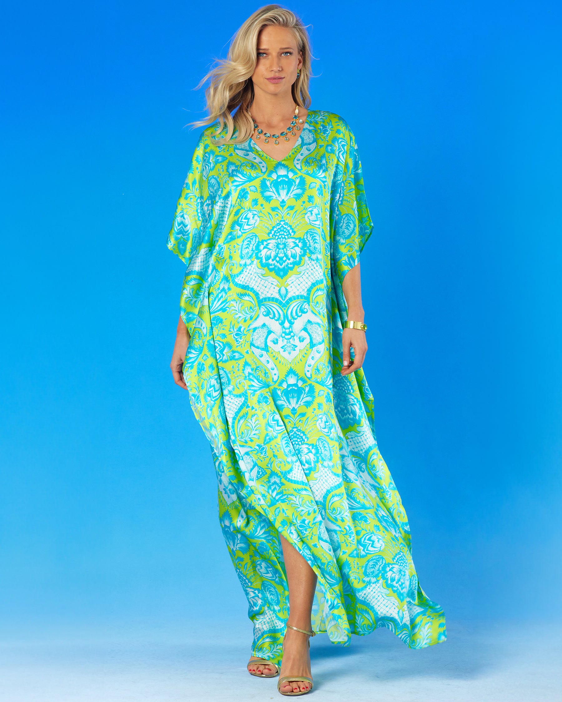 Shalimar Silk Kaftan in Turquoise and Lime-ful frontal view with leg showing hte slit