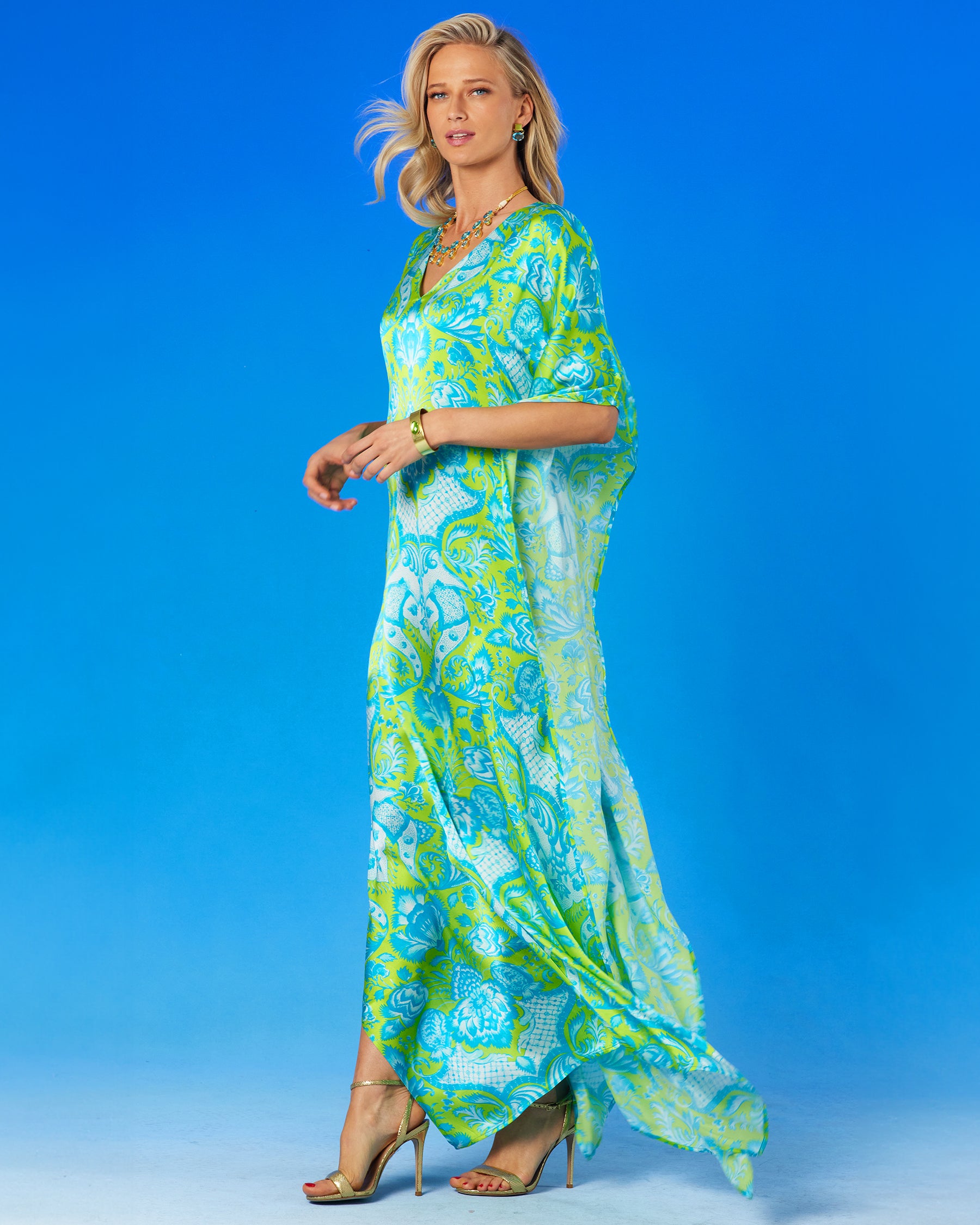 Shalimar Silk Kaftan in Turquoise and Lime-side view walking