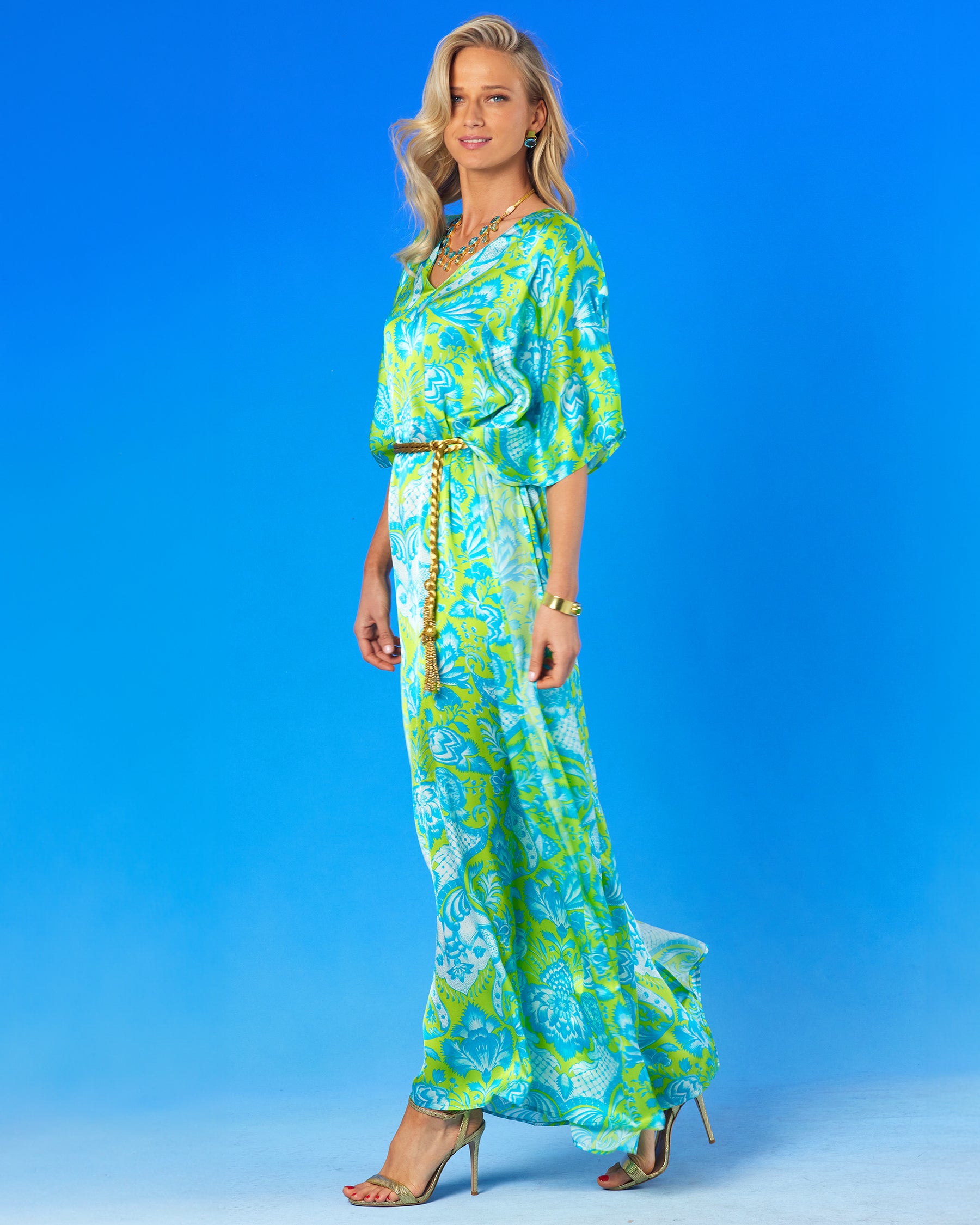 Shalimar Silk Kaftan in Turquoise and Lime-Side viewwalking and cinched with the Artemis Gold Rope Belt