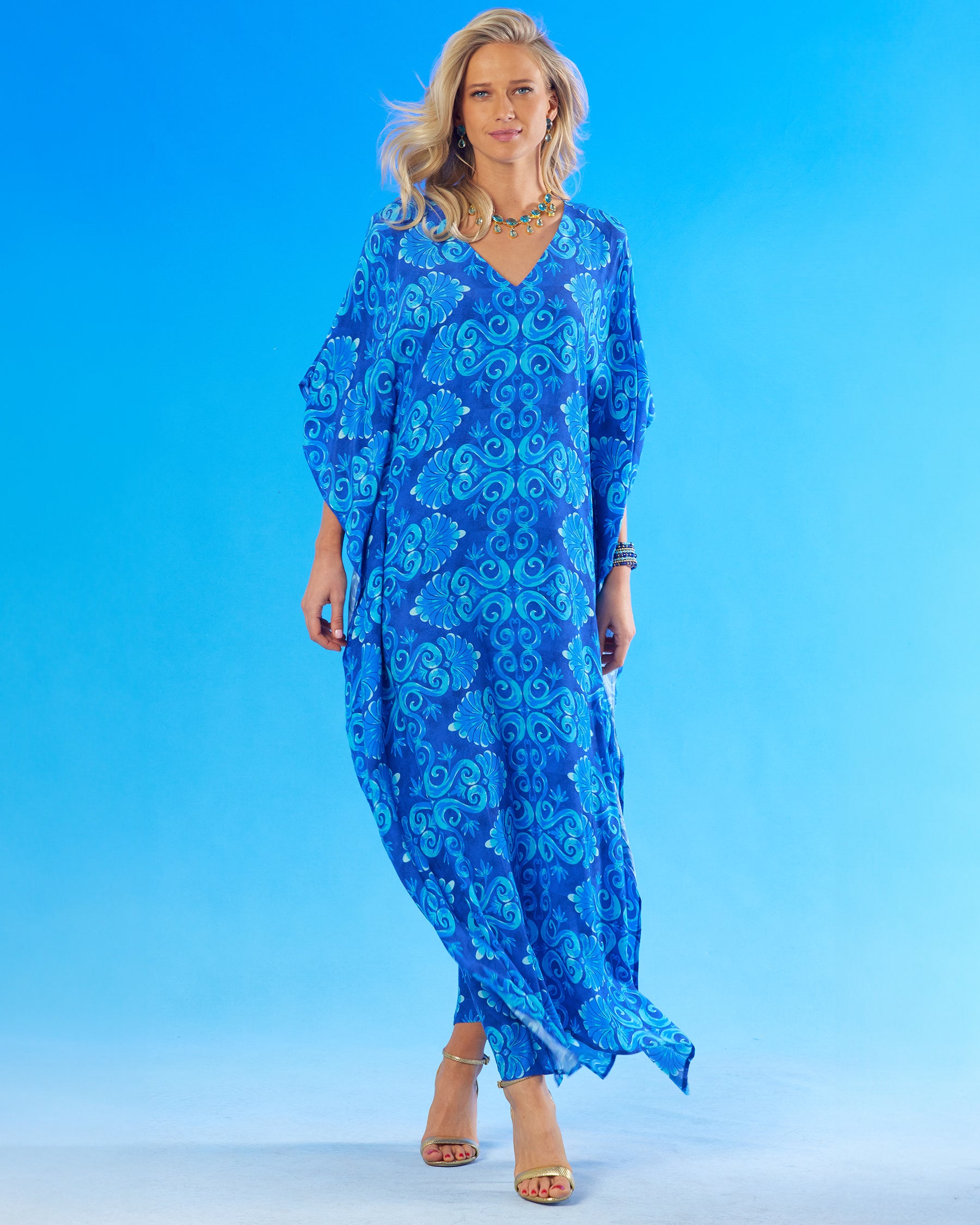 Thetis Long Kaftan in Mediterranean Blue-Full frontal view walking