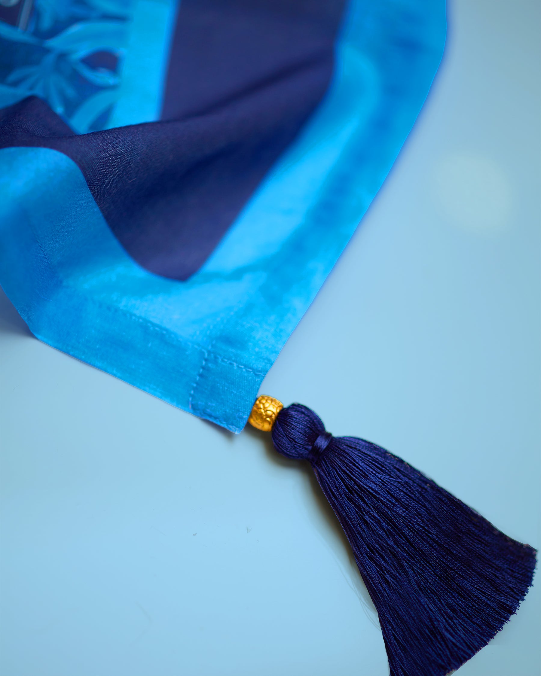 Thetis Organic Cotton Pareo in Mediterranean Blue detail of tassel