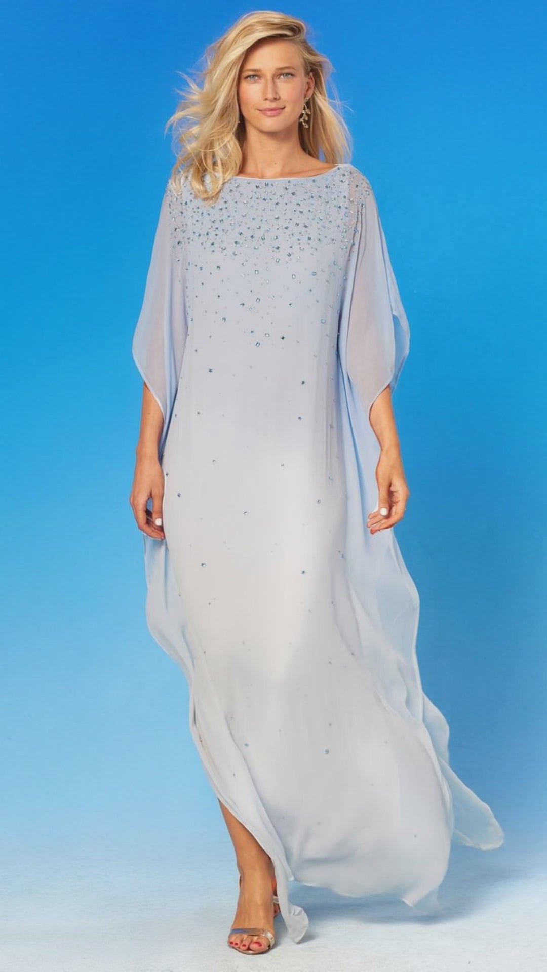 A vide of the Luna Chiffon Kaftan in Pale Blue Ombre and Embellishment blowing in the wind