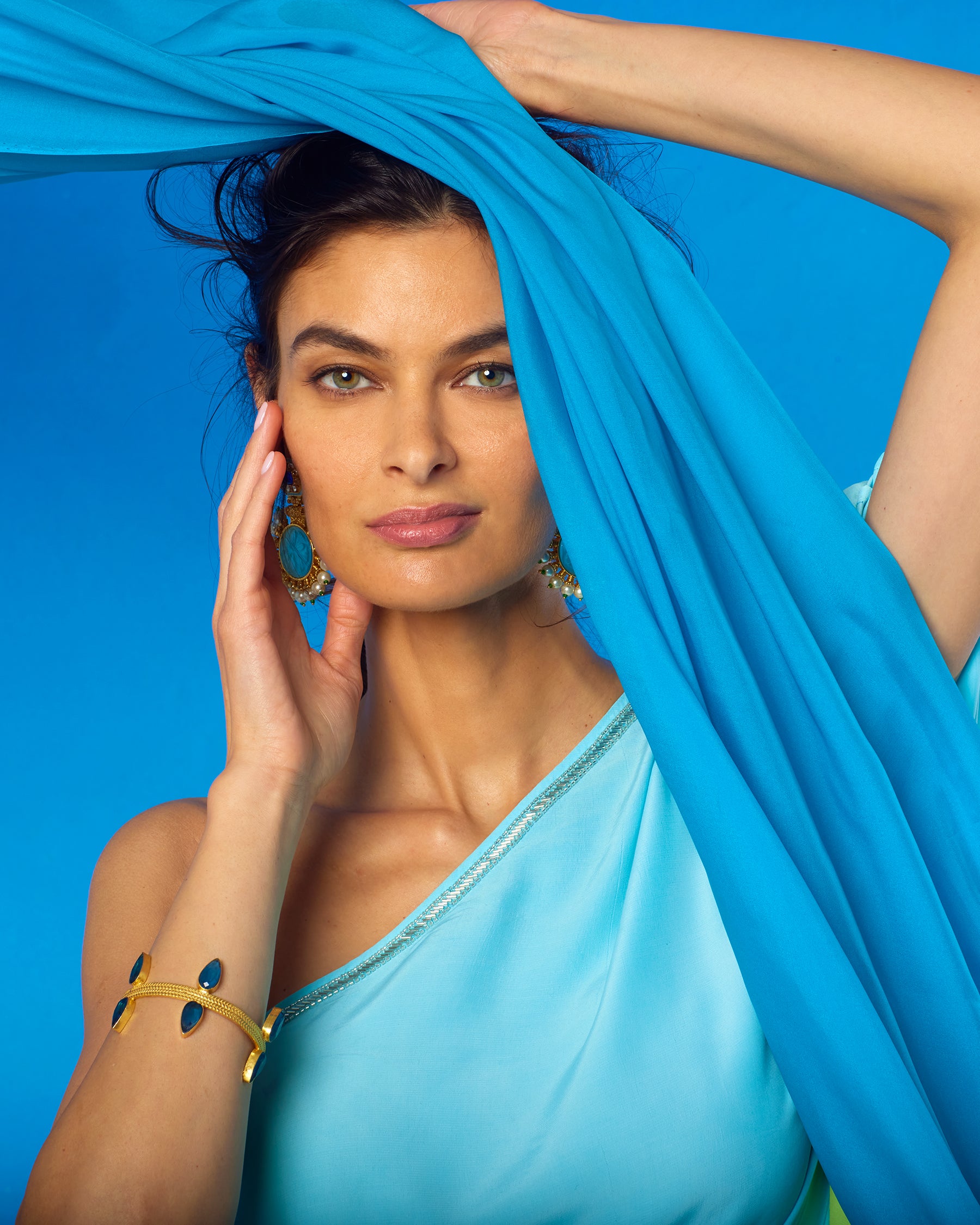 Aurelia Bangle worn with NicoBlu Elektra One Shouldre Gown