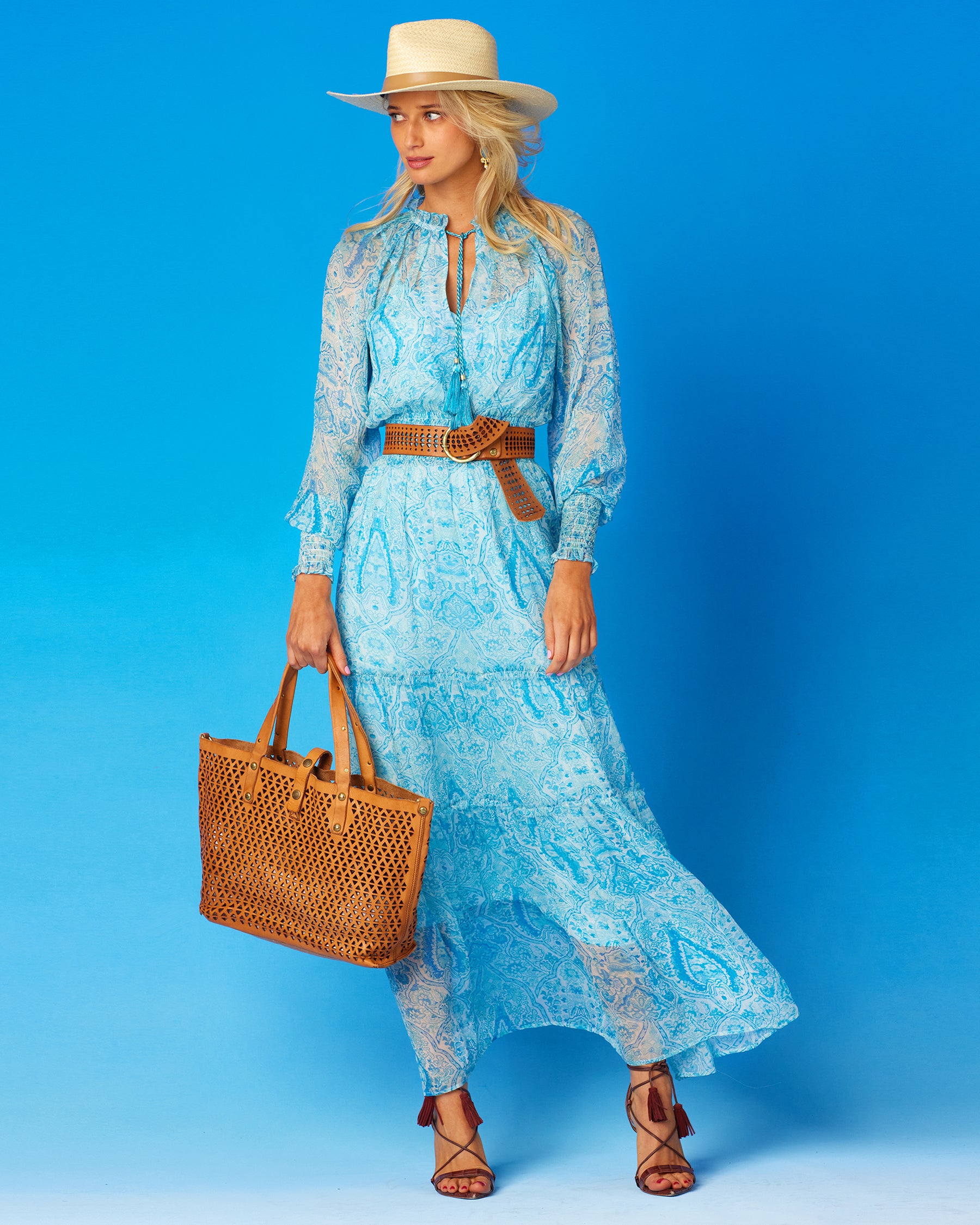 Campomaggi Malibu Pyramid Cut Tote Bag in Tan orn with the Emillie Bohemian Maxi Dress