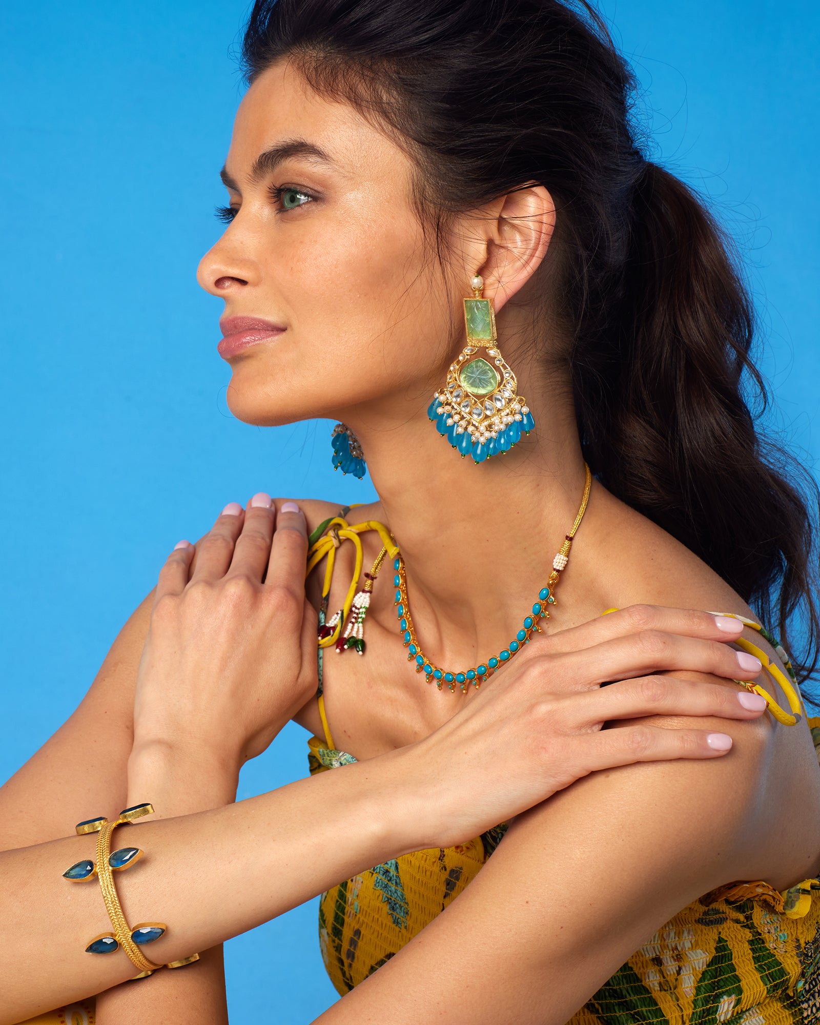 Aurelia Bangle-worn by a moidel wearing the Flora Shiurred Yellow Long Dress