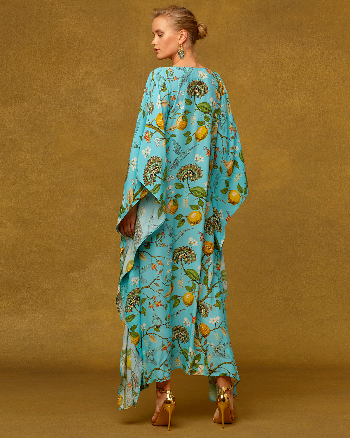 Flora Long Kaftan in Turquoise Hummingbird Print-full length back view