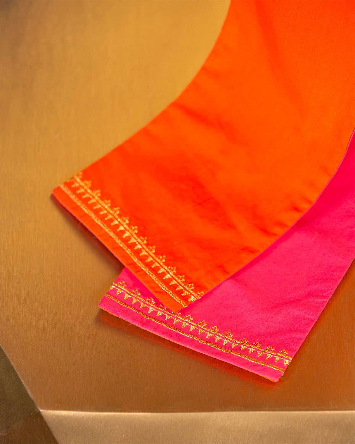 Maharani Reversible Sash Belt in Fuchsia and Coral Orange-closeup of gold emboirdery