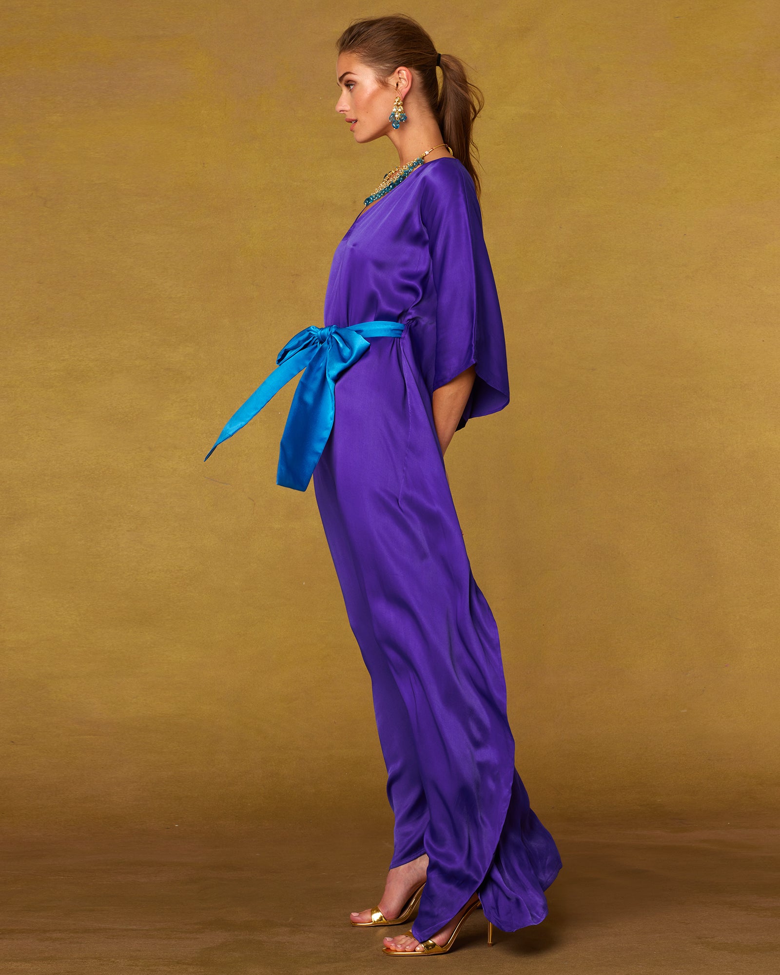 Full side view of the Alessandra Belted Silk Kaftan in Royal Purple