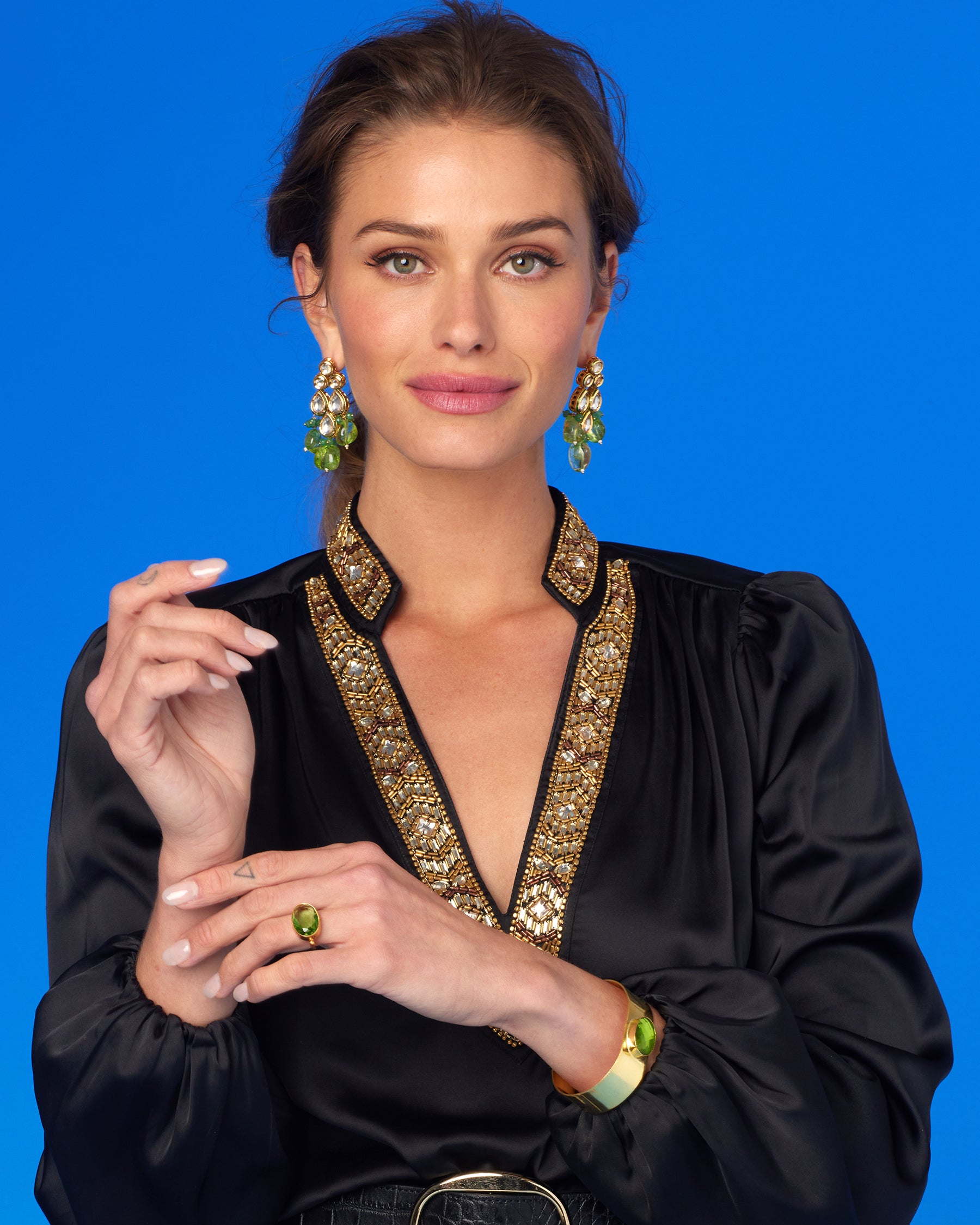 Bettina Ring in Crystal Moss Green-Wearing the Anastasia Black Blouse with Gold Embellishment