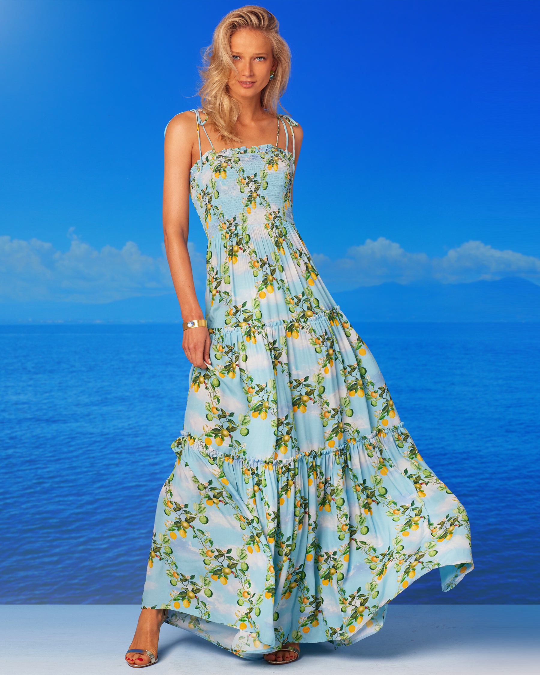 Annabelle Long Shirred Ruffle Dress in French Citrus Trellis-In front of the Mediterranean Sea