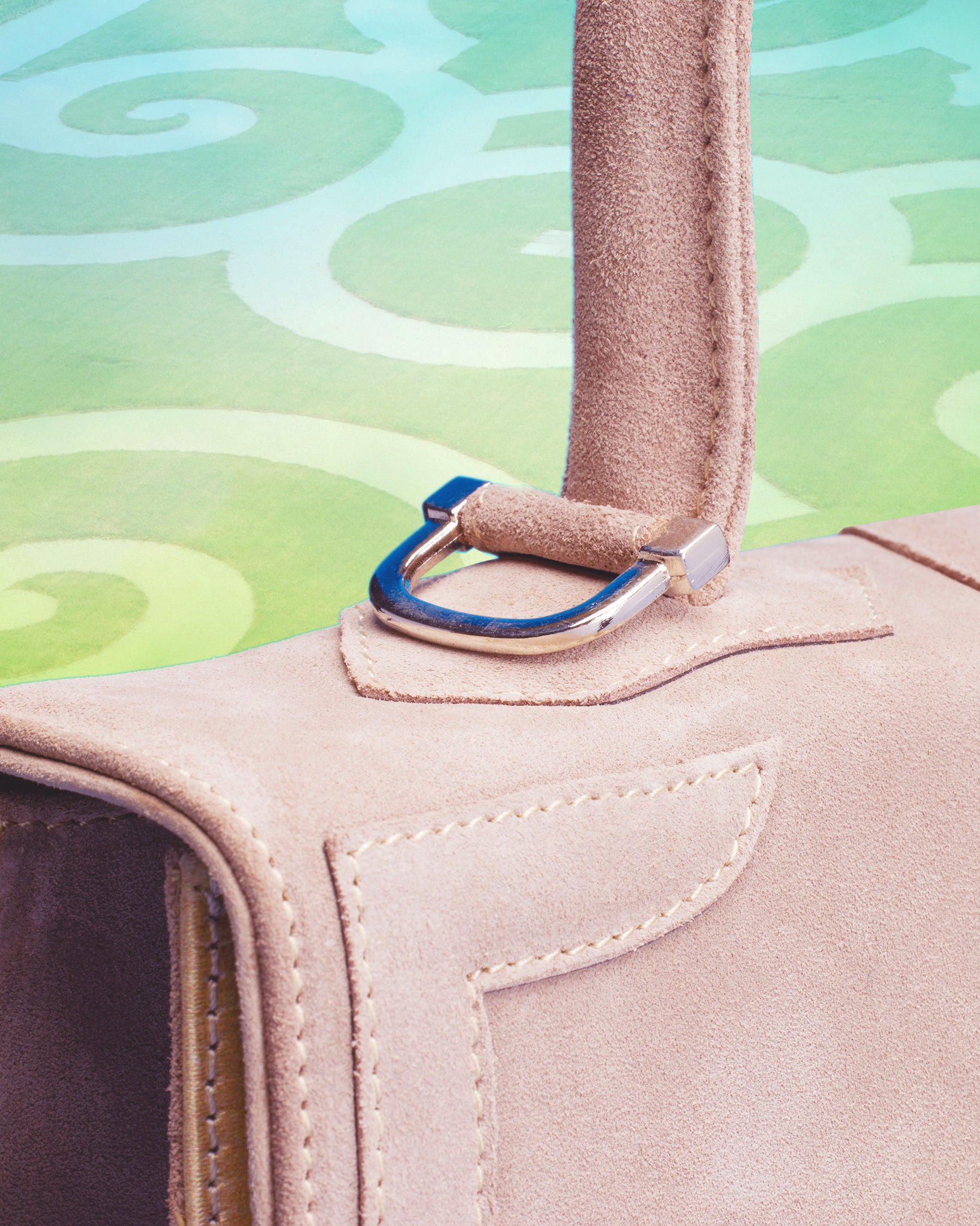 Detail view of the Marquise Paris Champs-Élysées Equestrian Top Handle Shoulder Bag in Soft Pink