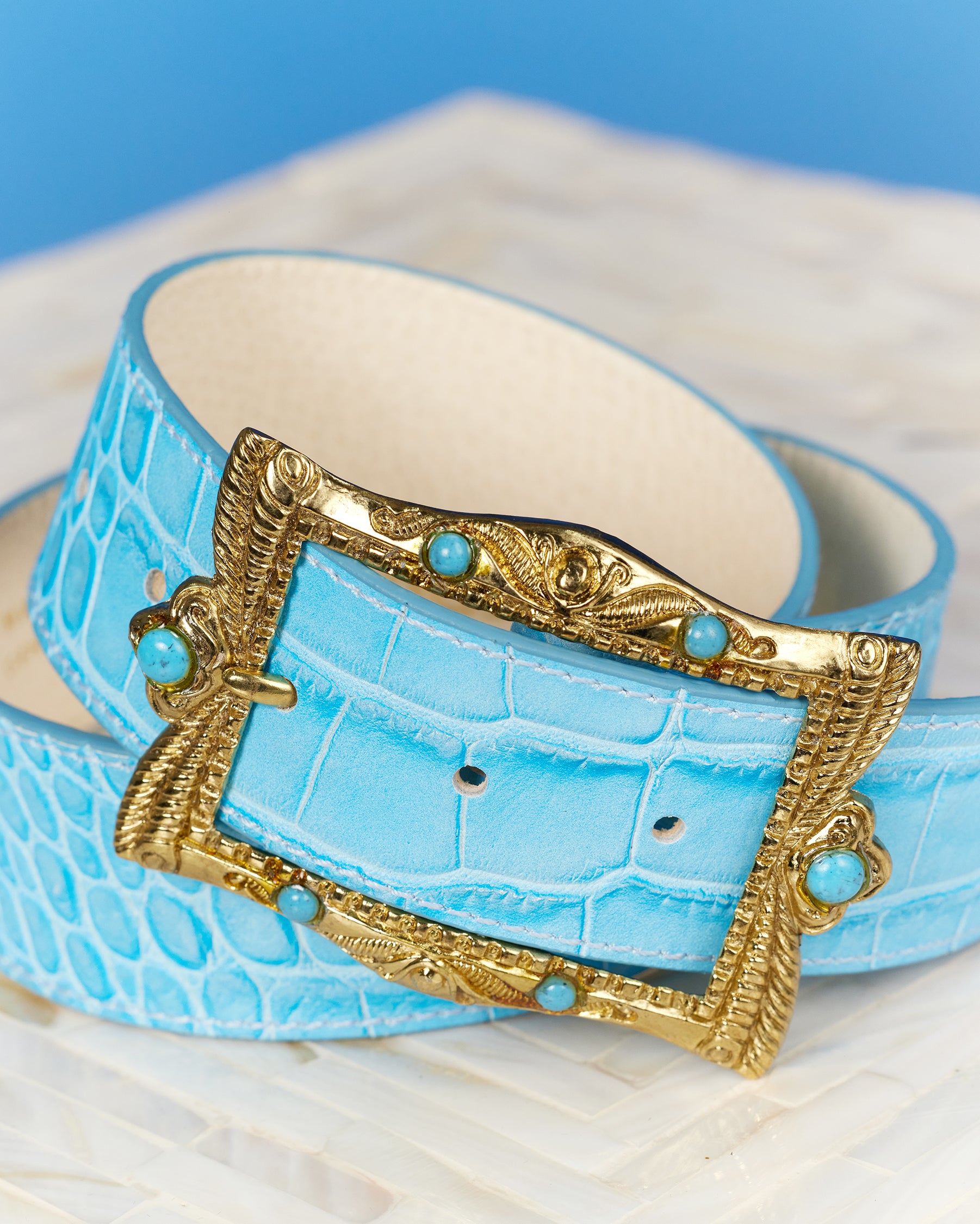 Blair Leather Belt in Croc-Embossed Turquoise-closeup of the belt buckle