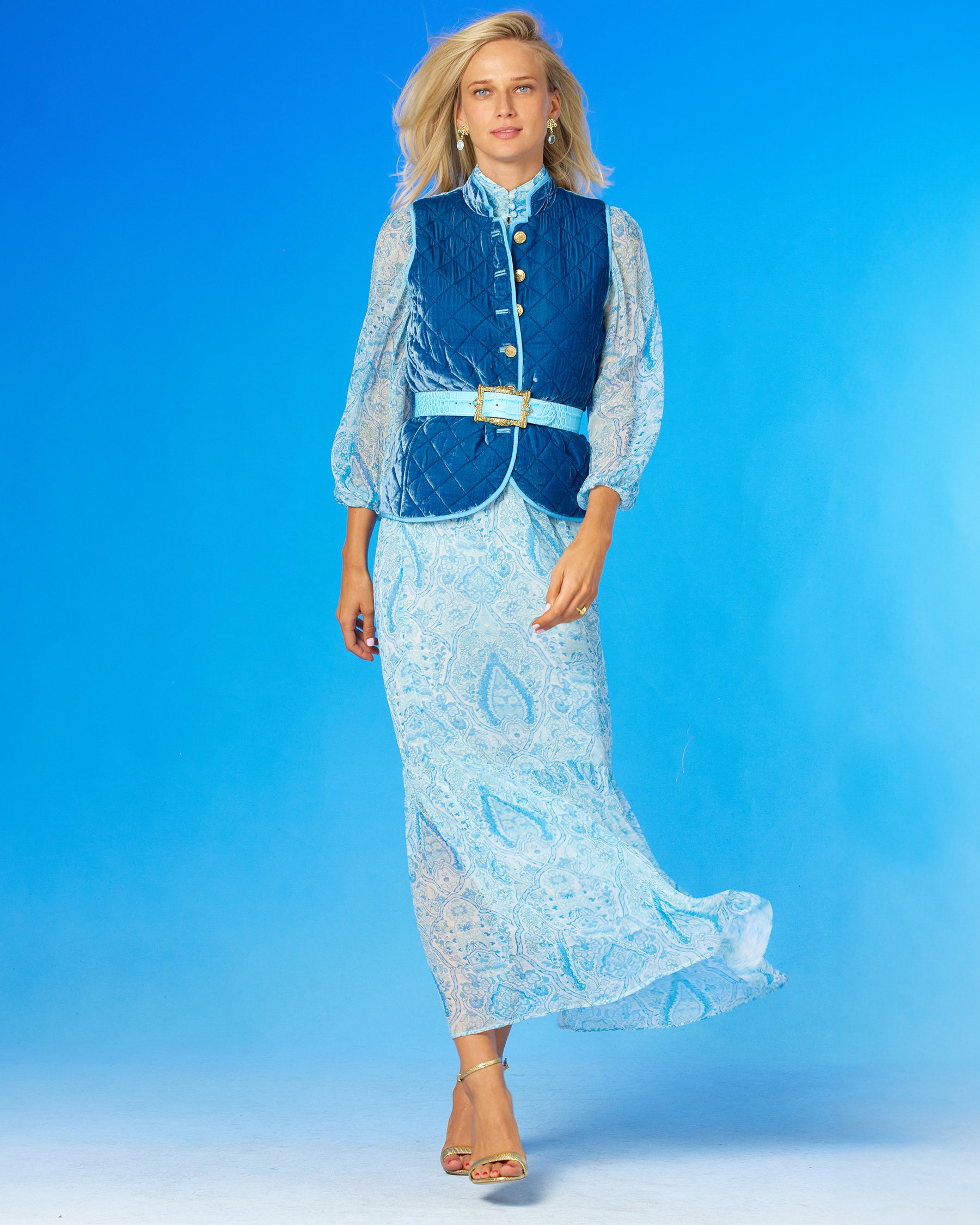 Blythe Maxi Crinkle Chiffon Dress in Turquoise Paisley worn with a blue quilted gilet