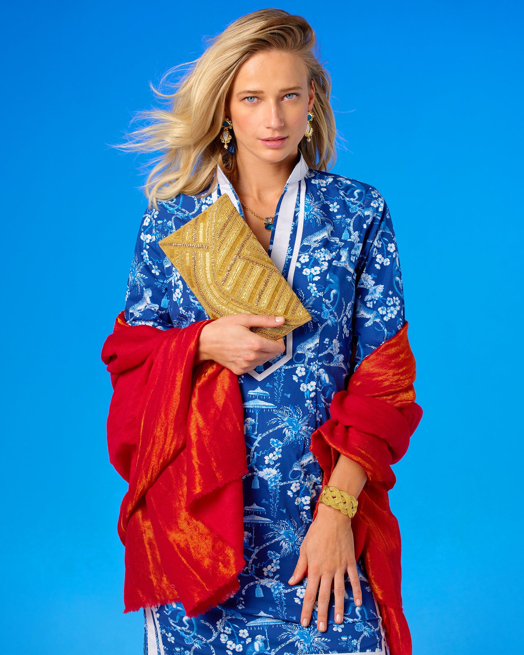 Capri Short Tunic Dress in Whimsical Blue and White Jungle Toile closeup view with Betty Gold Beaded Clutch Bag and Josephine Cashmere Pashmina Shawl