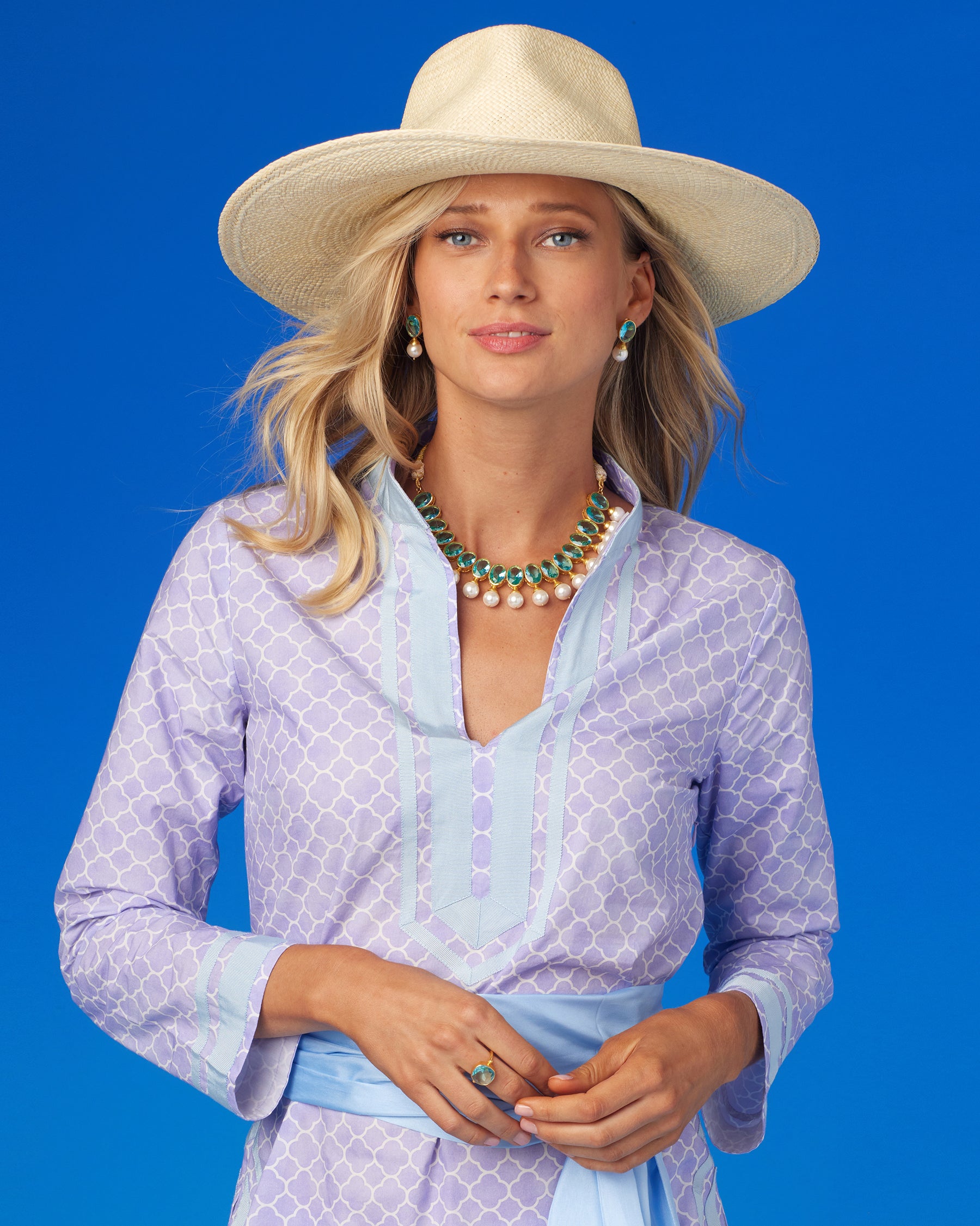 Darby Ring in Crystal Turquoise-Wearing the Capri Tunic in Alhambra Sunset Lavender Print