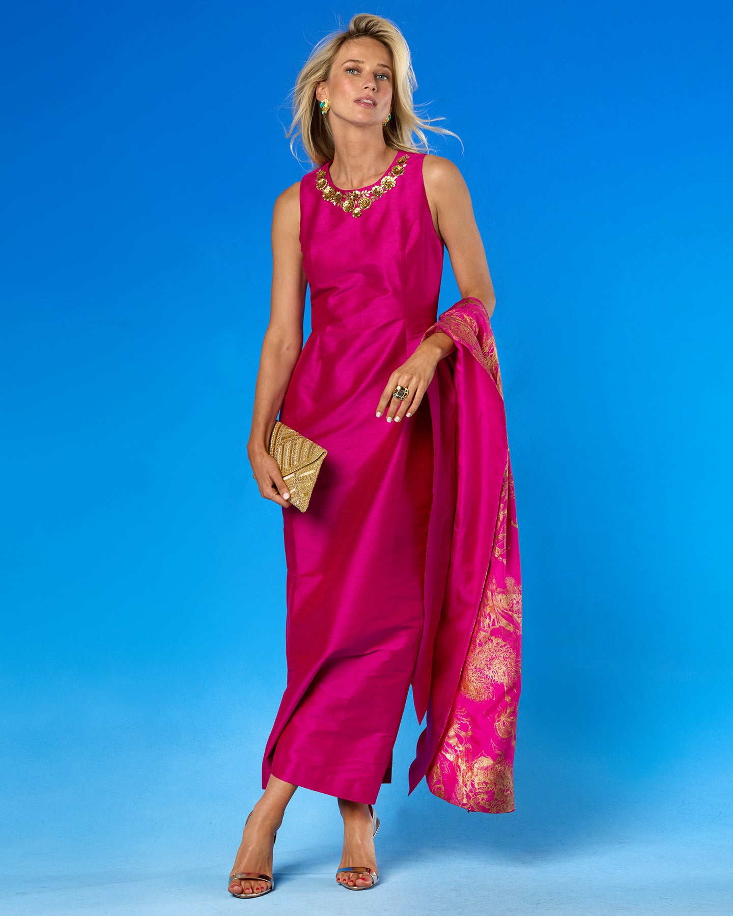 The Cassidy Silk Shawl in Fuchsia with Gold Floral Toile worn with the Cassandra Long Sheath Dress in Fuchsia and Gold Floral Embellishment