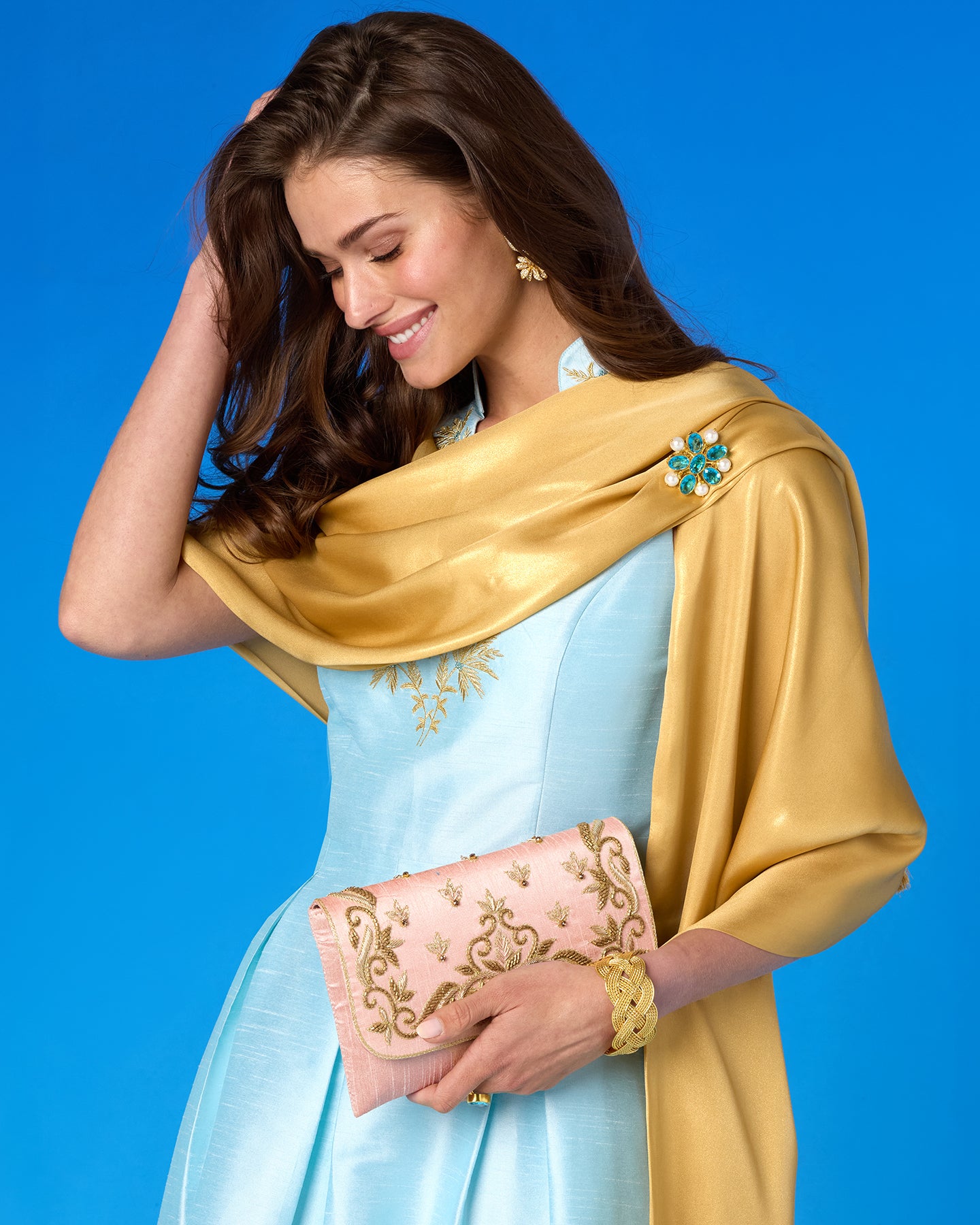 The Piper Nautical Rope Cuff Bracelet worn with the Celestine Gown in Pastel Blue and Gold Palm Embroidery