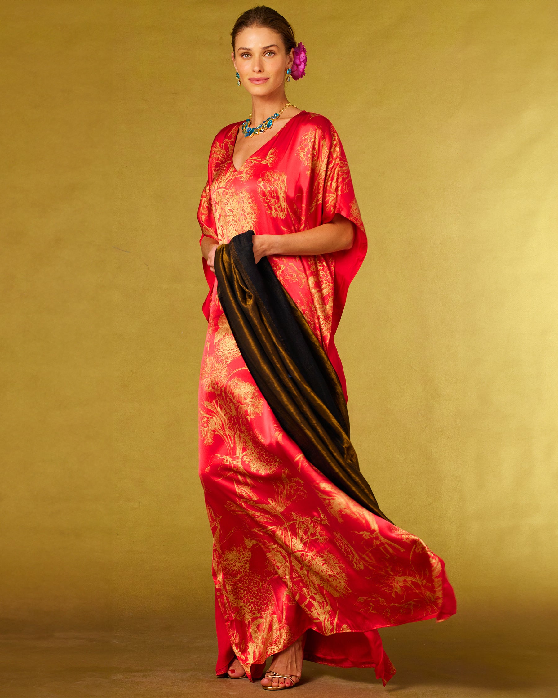 Josephine Reversible Pashmina Shawl in Bronze and Black worn with the Chantal Red Silk Kaftan in Gold Floral Toile