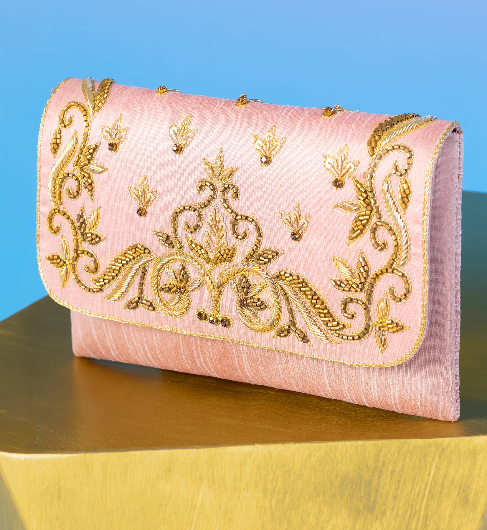 The Corelia Clutch in Blush Pink and Gold Embellishment side view