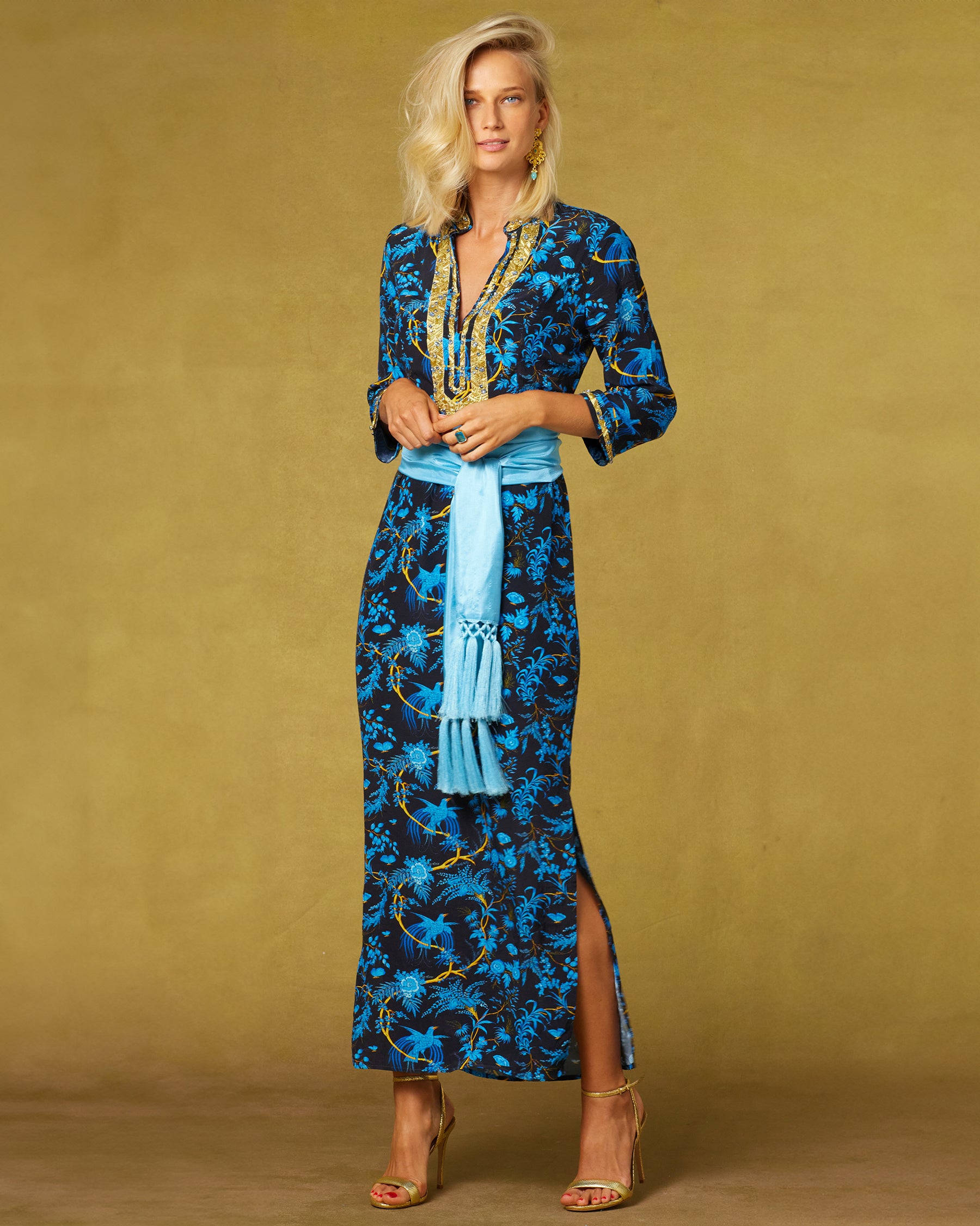 Darcy Long Navy Tunic Dress in Midnight Garden and Gold Embellishment front full view with waist cinched by the Cosima Turquoise Sash Belt