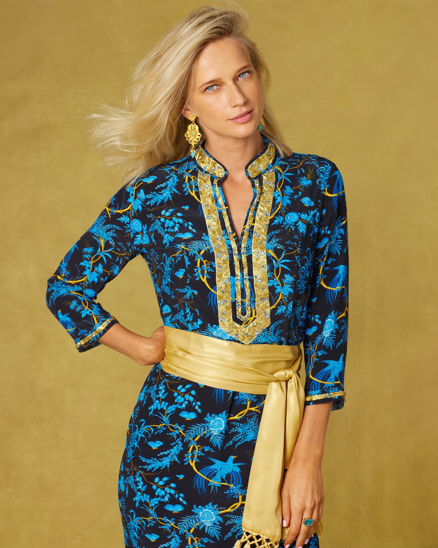 Darcy Long Navy Tunic Dress in Midnight Garden and Gold Embellishment-closer view and hand on hip