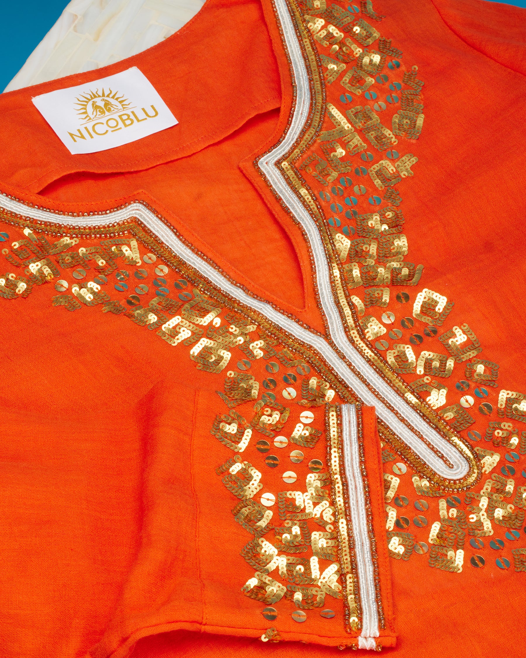 Alba Cover-Up Tunic in Coral Orange and Embellishment-Detail