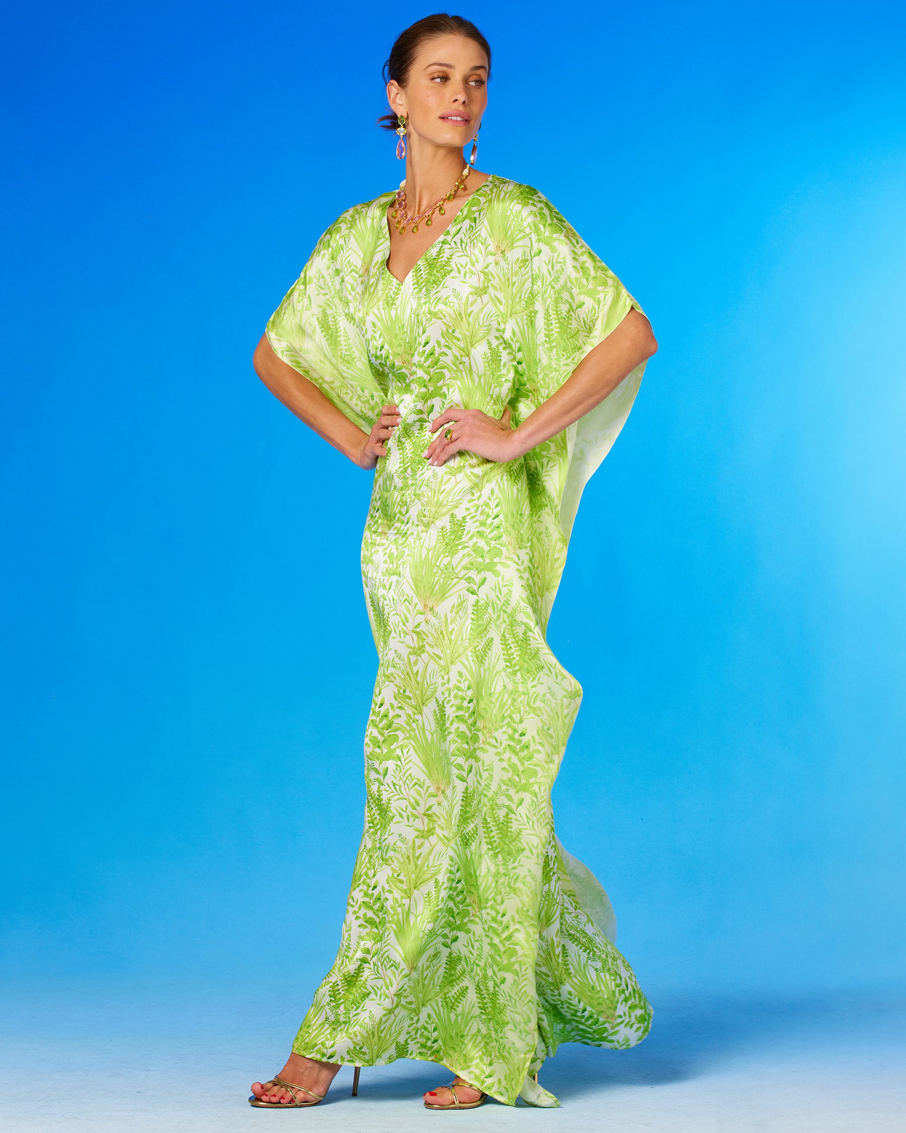 Eve Silk Kaftan in Delicate Greenery-side view with arms  on waist