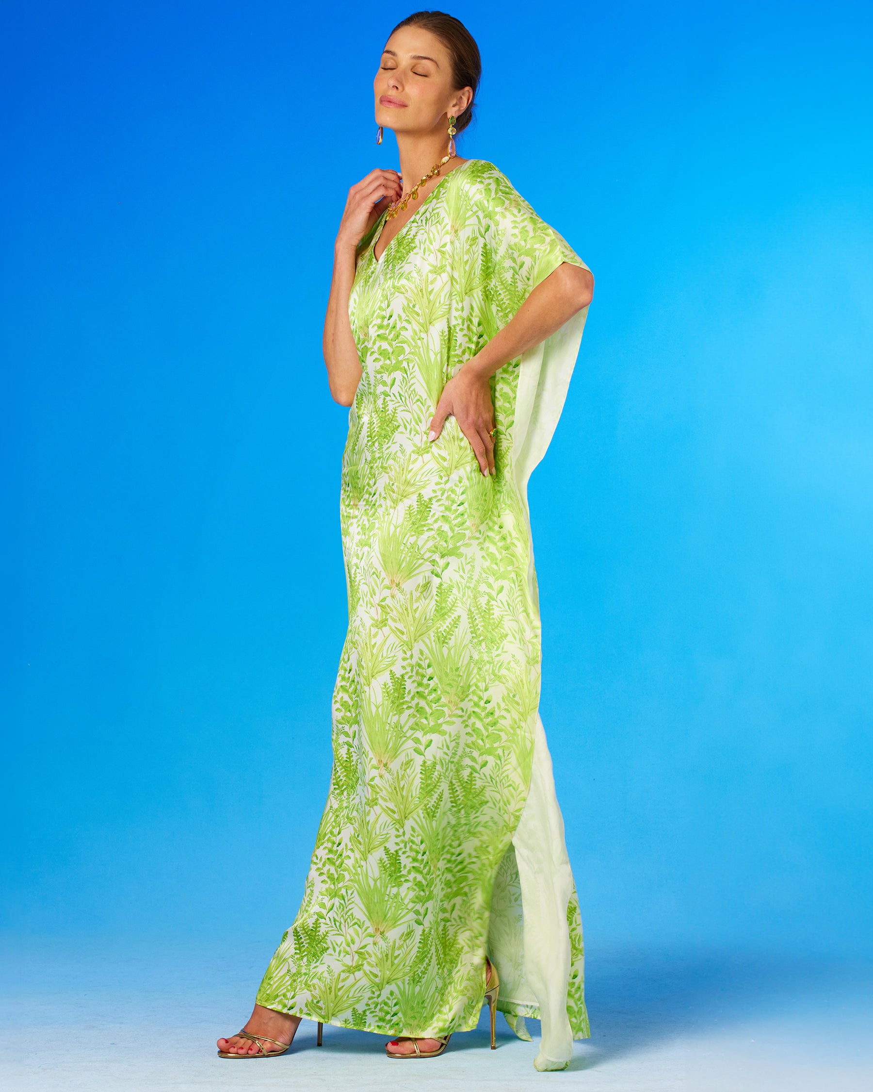 Eve Silk Kaftan in Delicate Greenery-side view with eyes closed