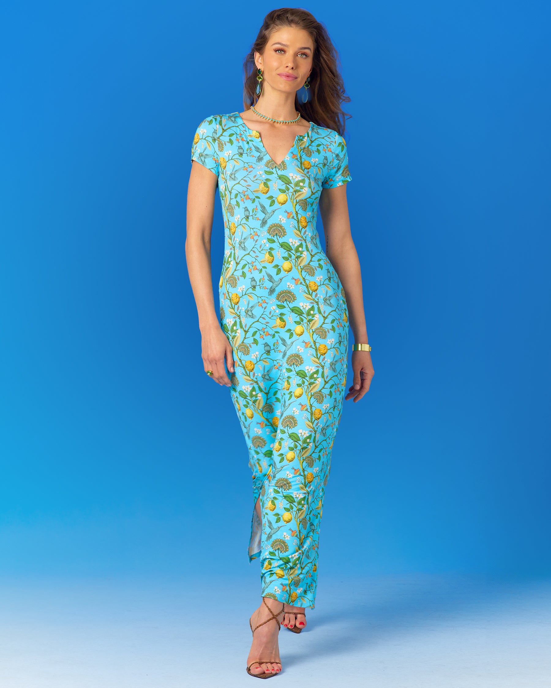 Flora Long Stretch Dress in Turquoise Hummingbird Print-Walking Front View