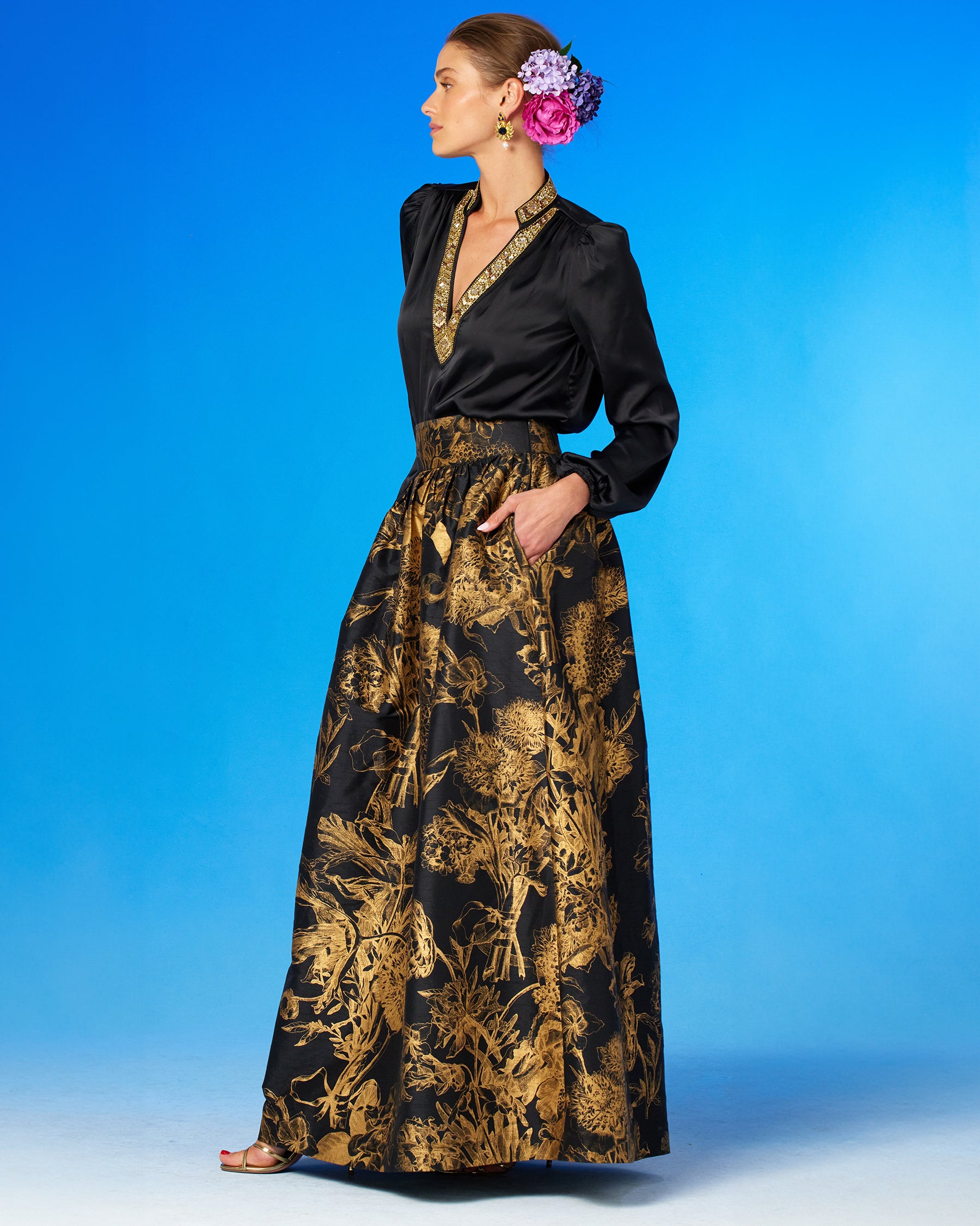 Florence Long Full Skirt in Black and Gold Floral Toile and the Anastasia Blouse-Front View-Hand in pocket