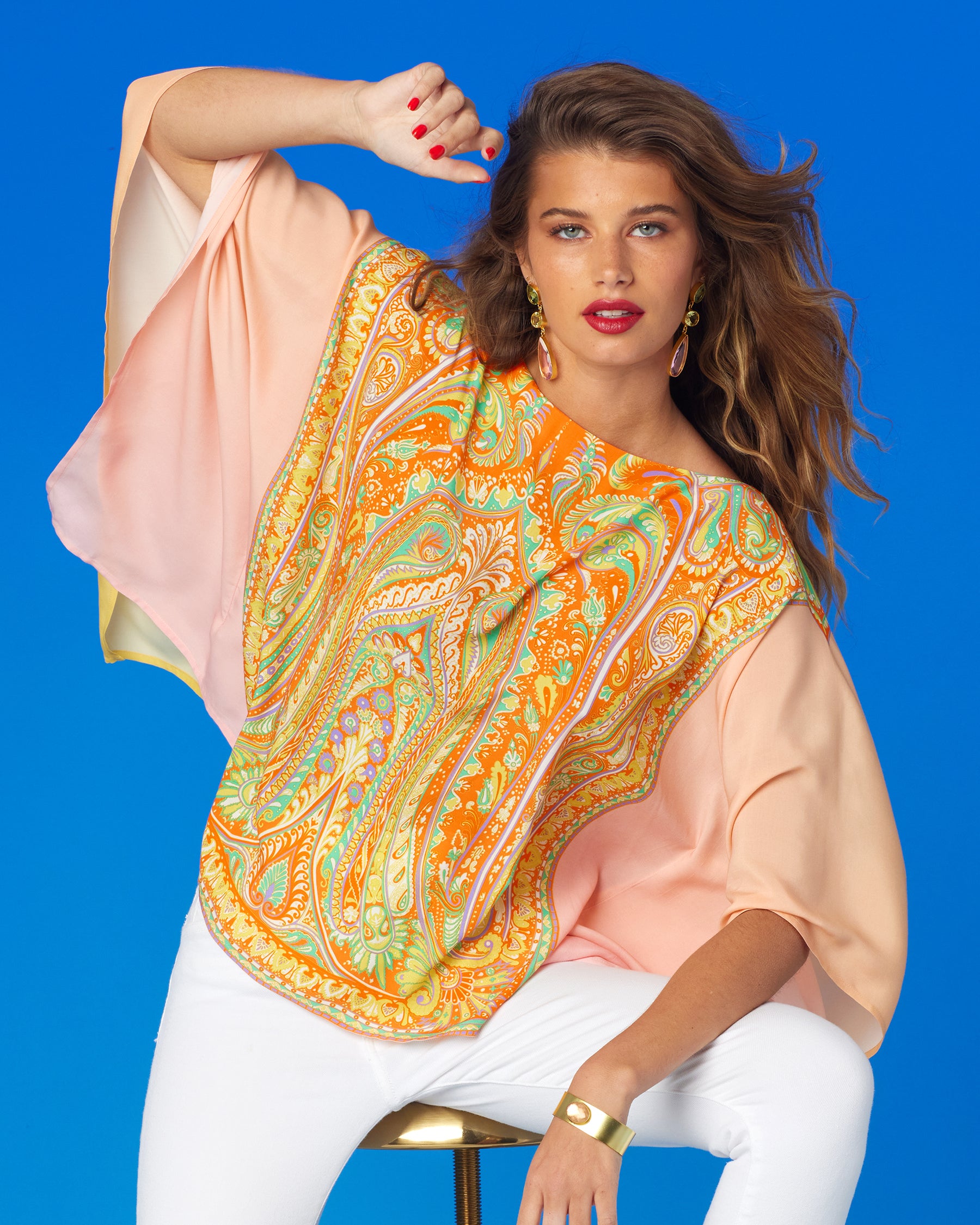 Gaia Poncho in Sunset Paisley-Arm Up Front View