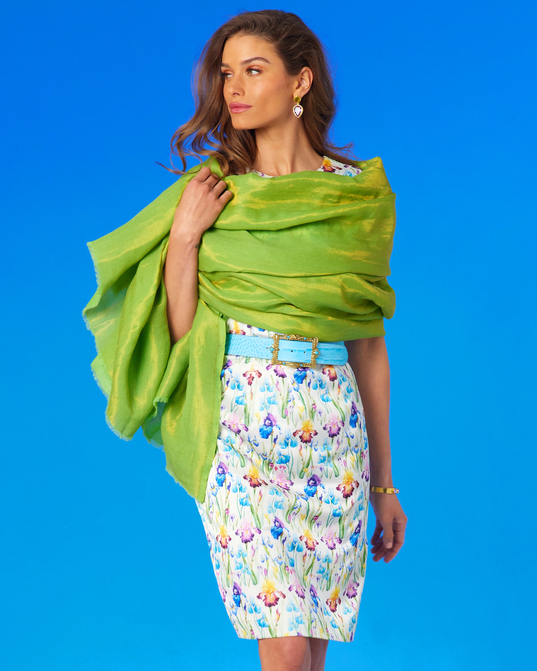 Iris Sheath Dress in Elysian Meadow with the Josephine Reversible Pashmina Shawl in Gold Shimmer Lime draped around the shoulders