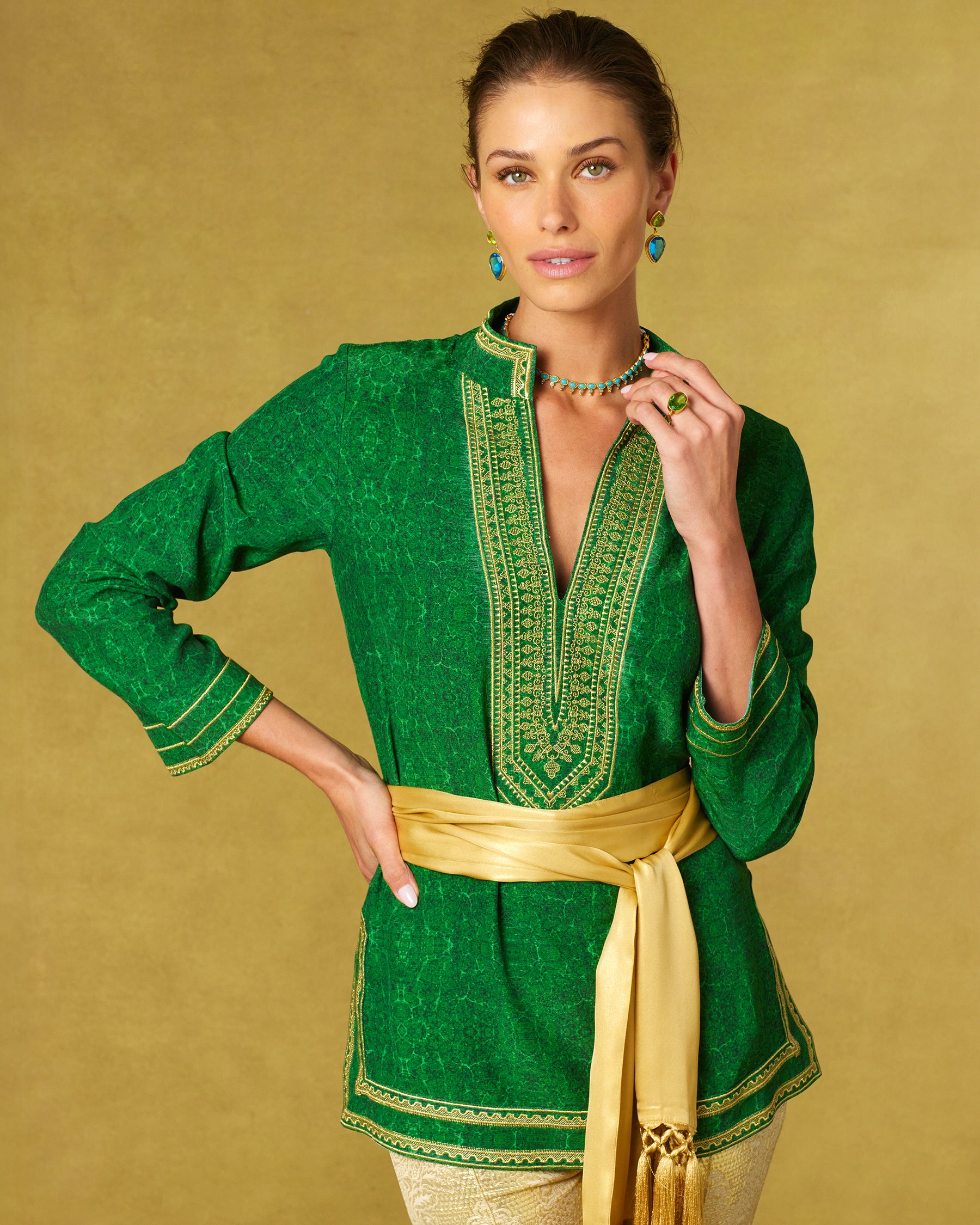 Isabelle Tunic in Malachite Burl and Gold Embroidery-arm on hip